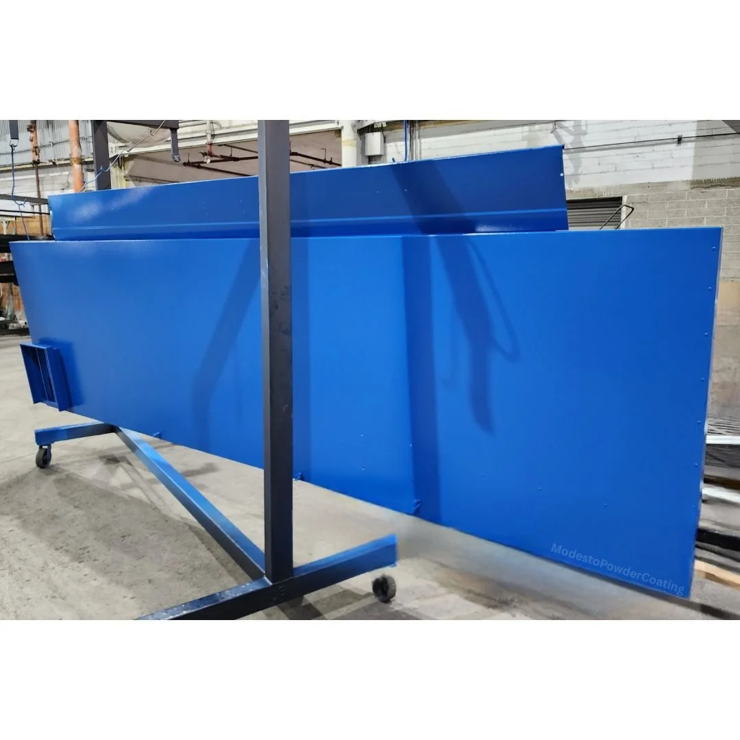 Large metal panels powder coated blue by modesto powder coating