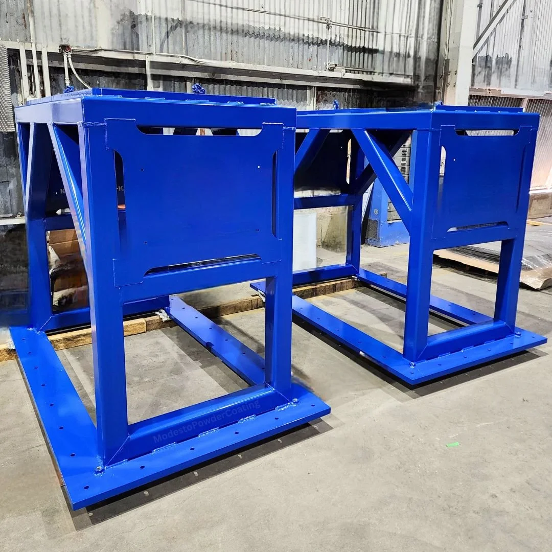 Two large metal frames powder coated blue by Modesto Powder Coating