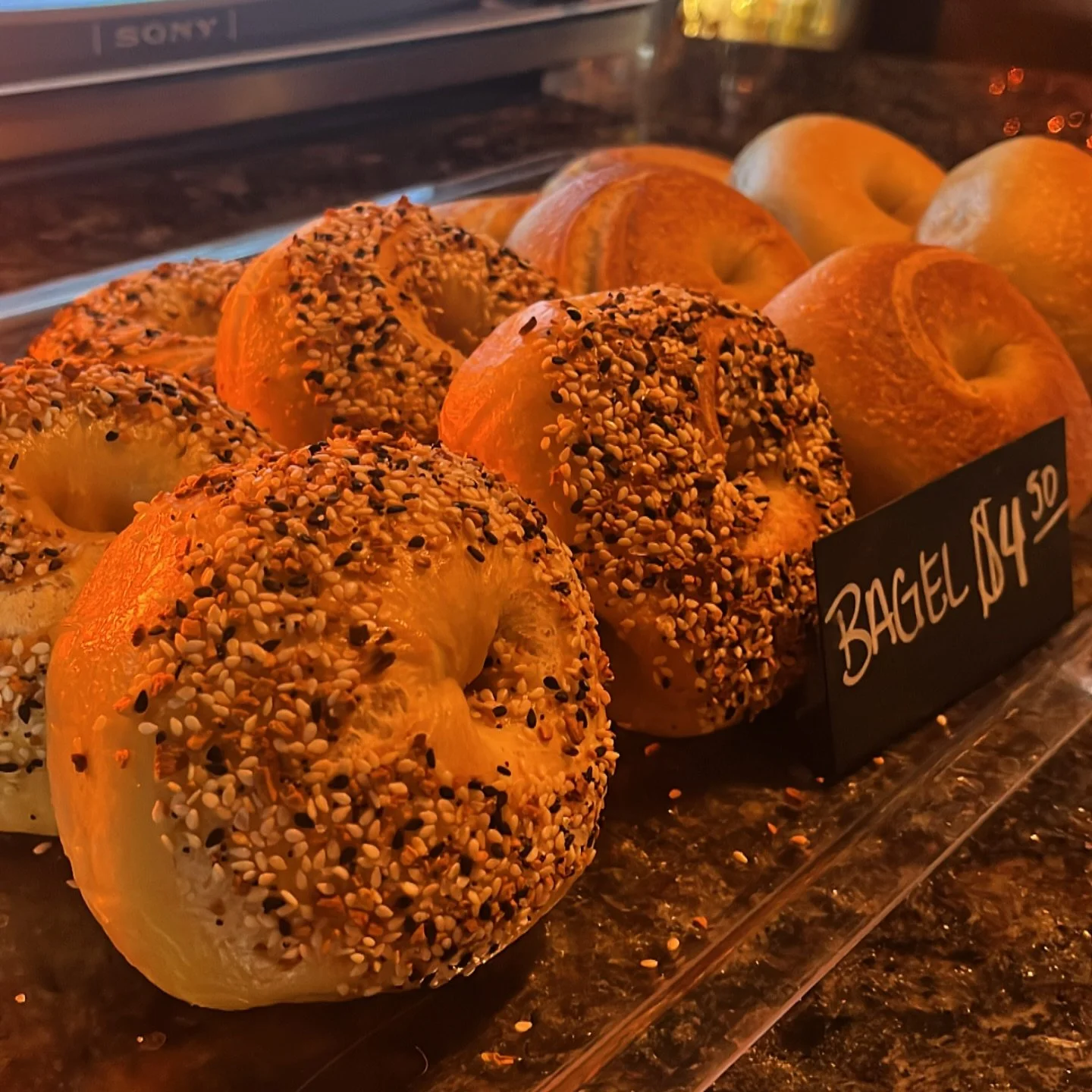 we got fresh baked bagels in the case this morning! come grab a bite! 🥯