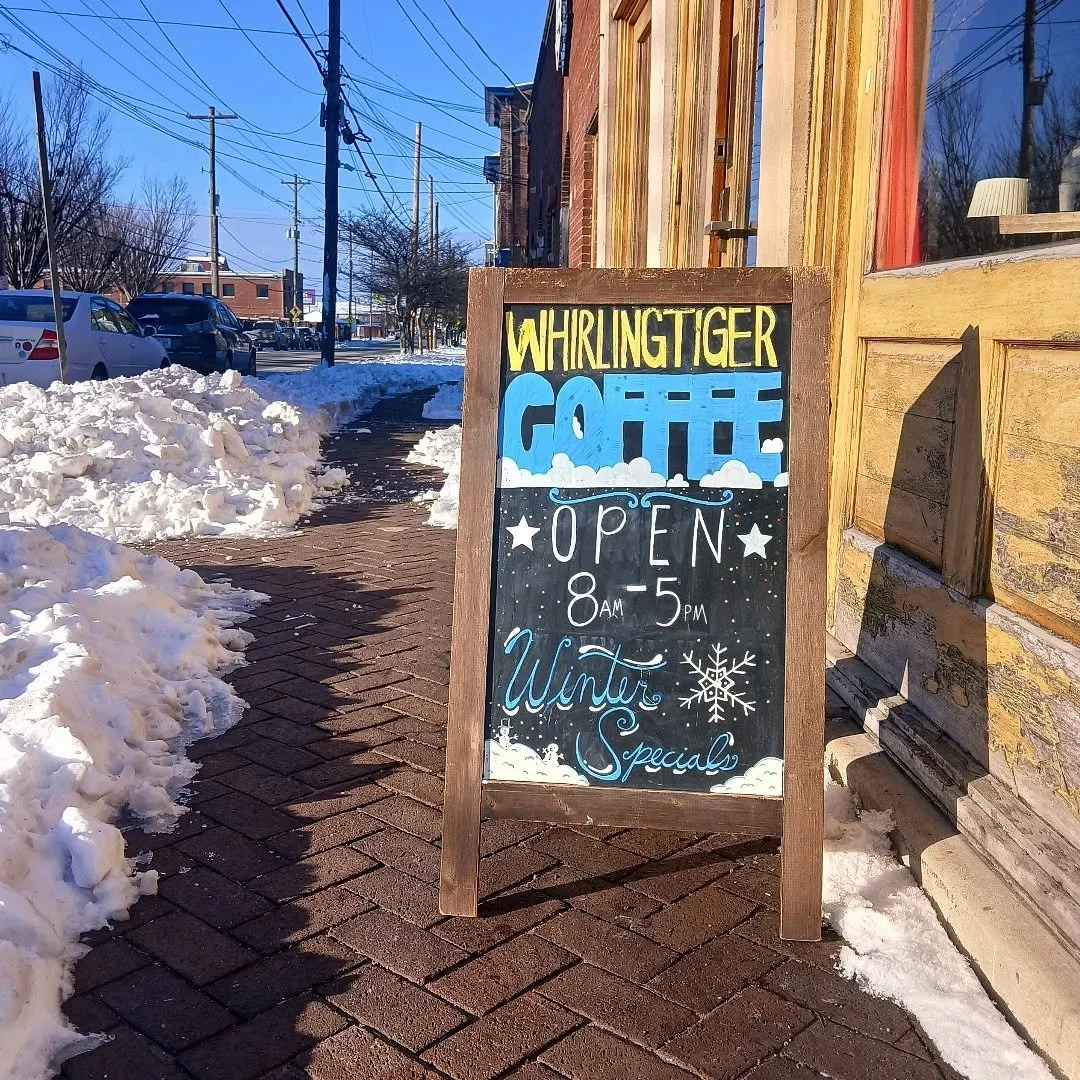 What's up you crazy cats! We're back and like the sign says we're open for coffee service from 8-5 today. Street parking is available on Story Avenue and we'll have the parking lot cleared this afternoon. Stop by, warm up, and enjoy our holiday drink