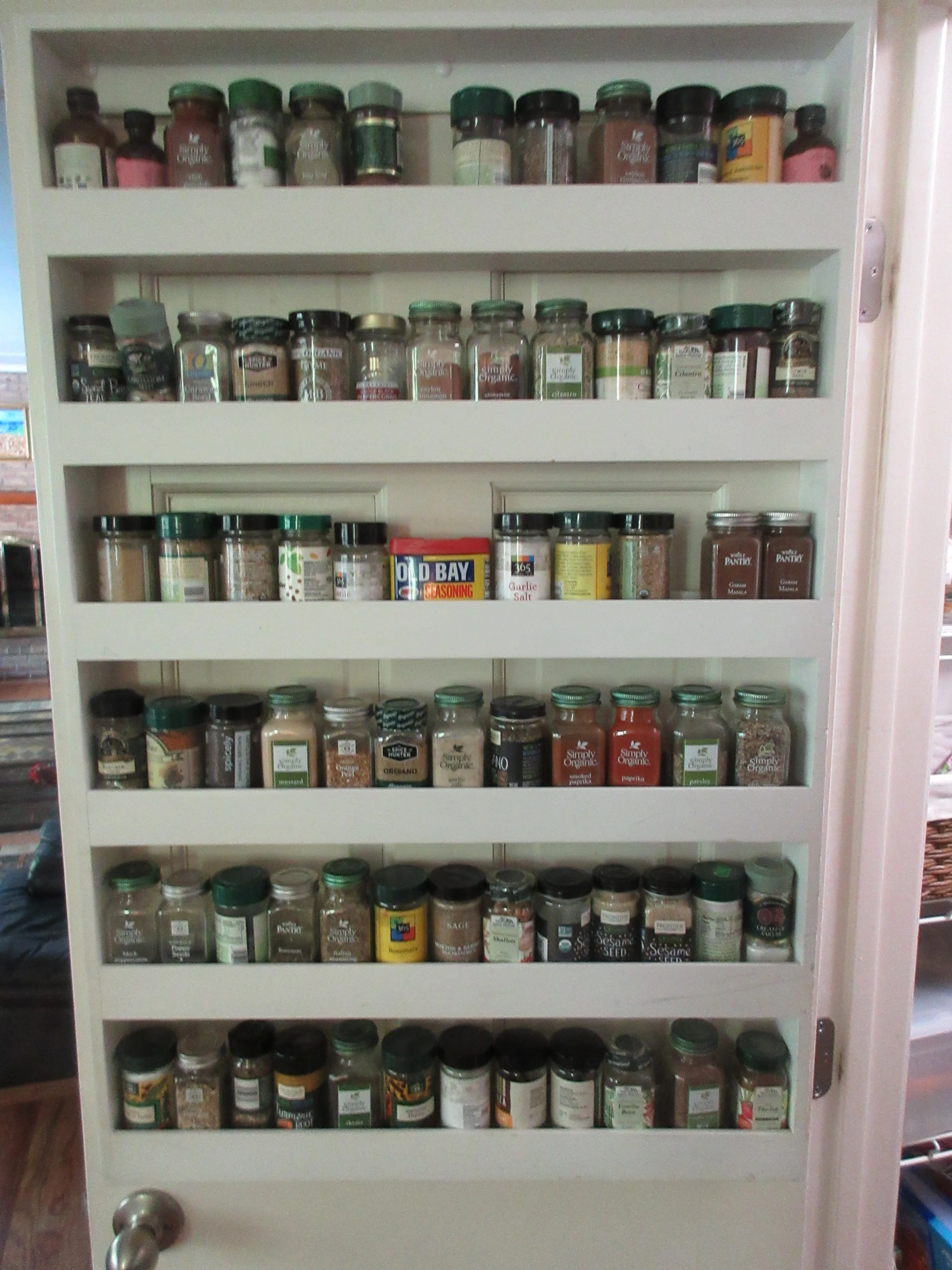 Spice rack on pantry door