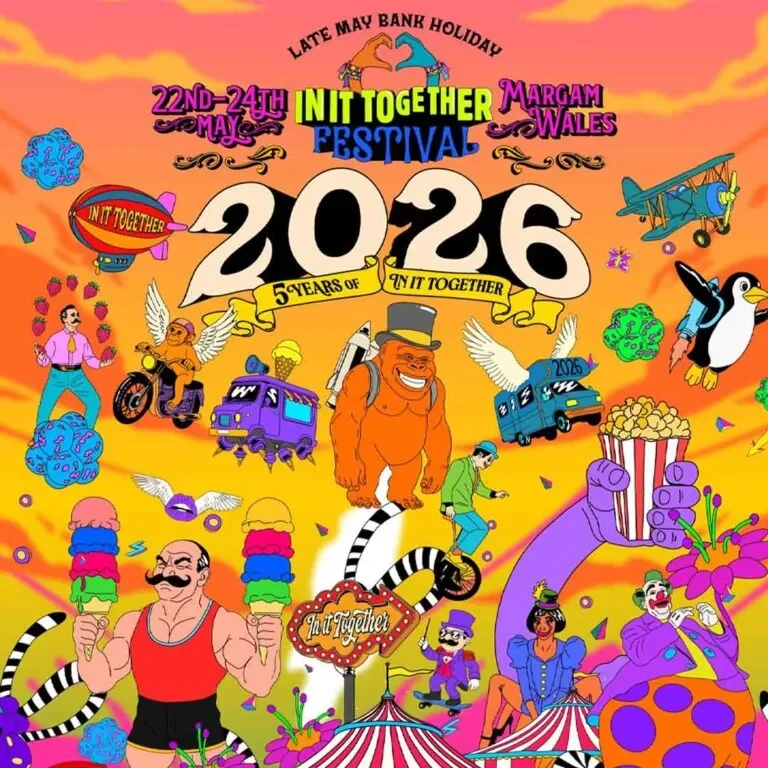 Colorful festival poster for the 2026 'INIT TOGETHER' event in Margam Wales, held from May 22-24, 2026, celebrating five years of the festival with illustrated clowns, animals, and festive decorations. Where you can find ONFIRE AND RESCUED FIRE TRUCK
