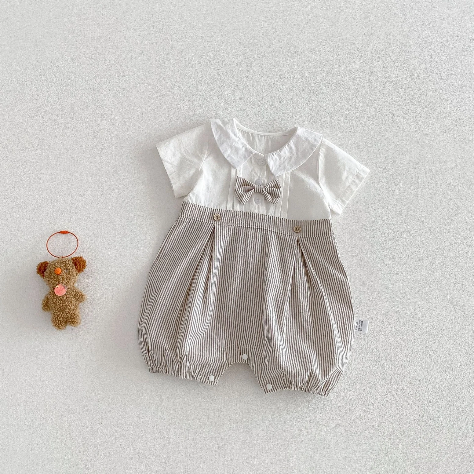 peter pan collared bow tie romper 2.webp