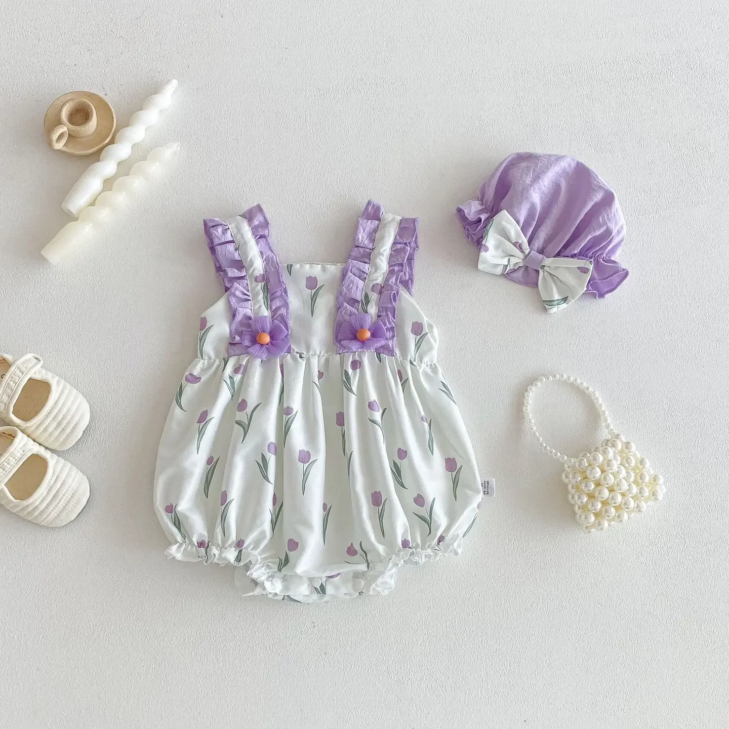 purple tulip ruffle romper 1.webp