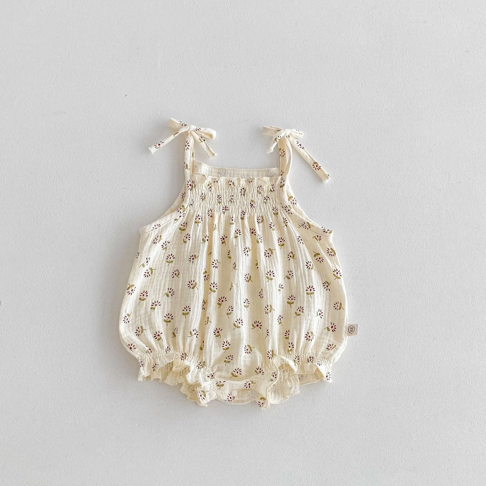 beige bow strapped romper 1.webp