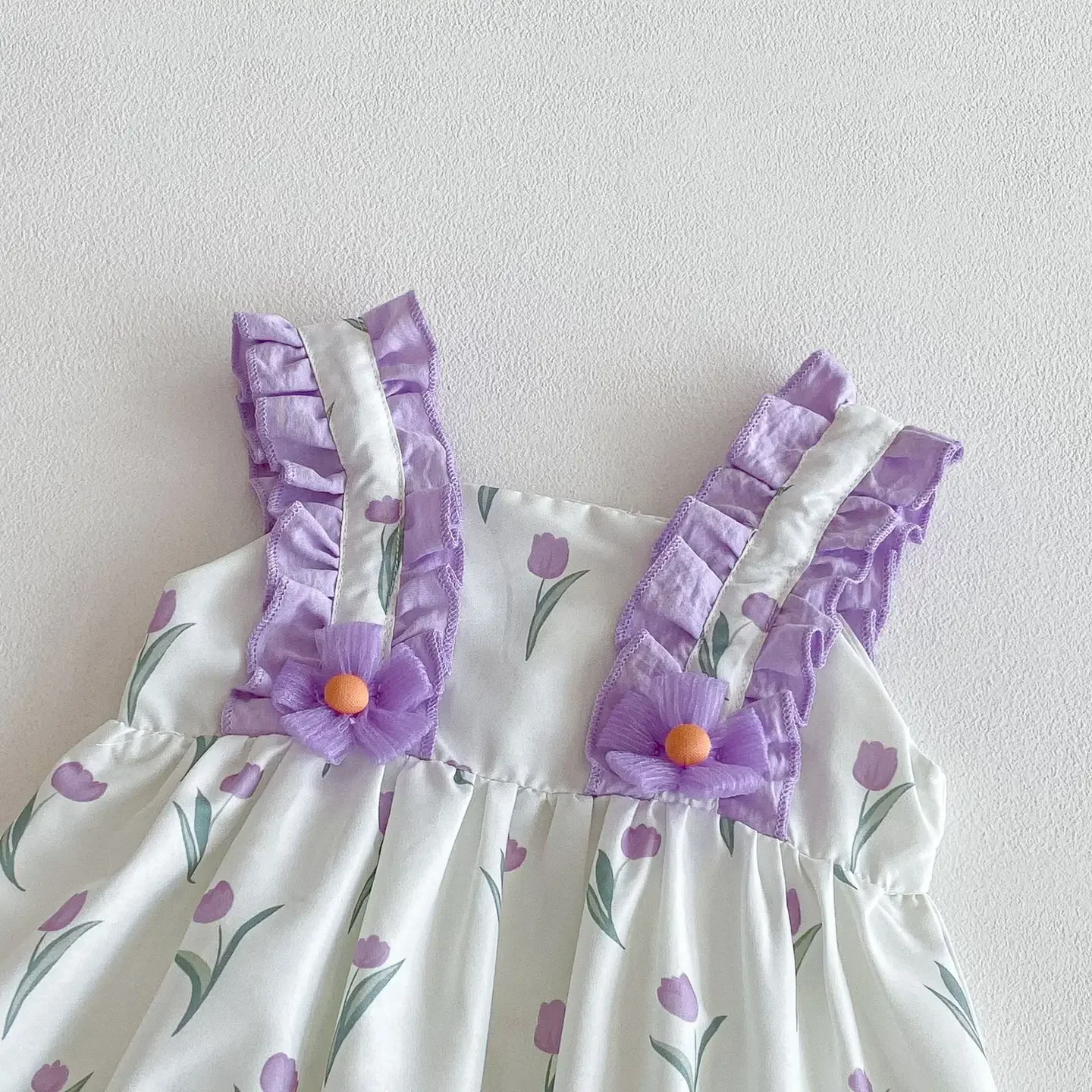 purple tulip ruffle romper 2.webp