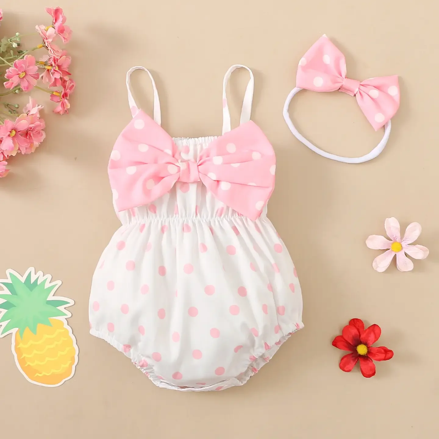 pink romper with oversized bow 1.webp
