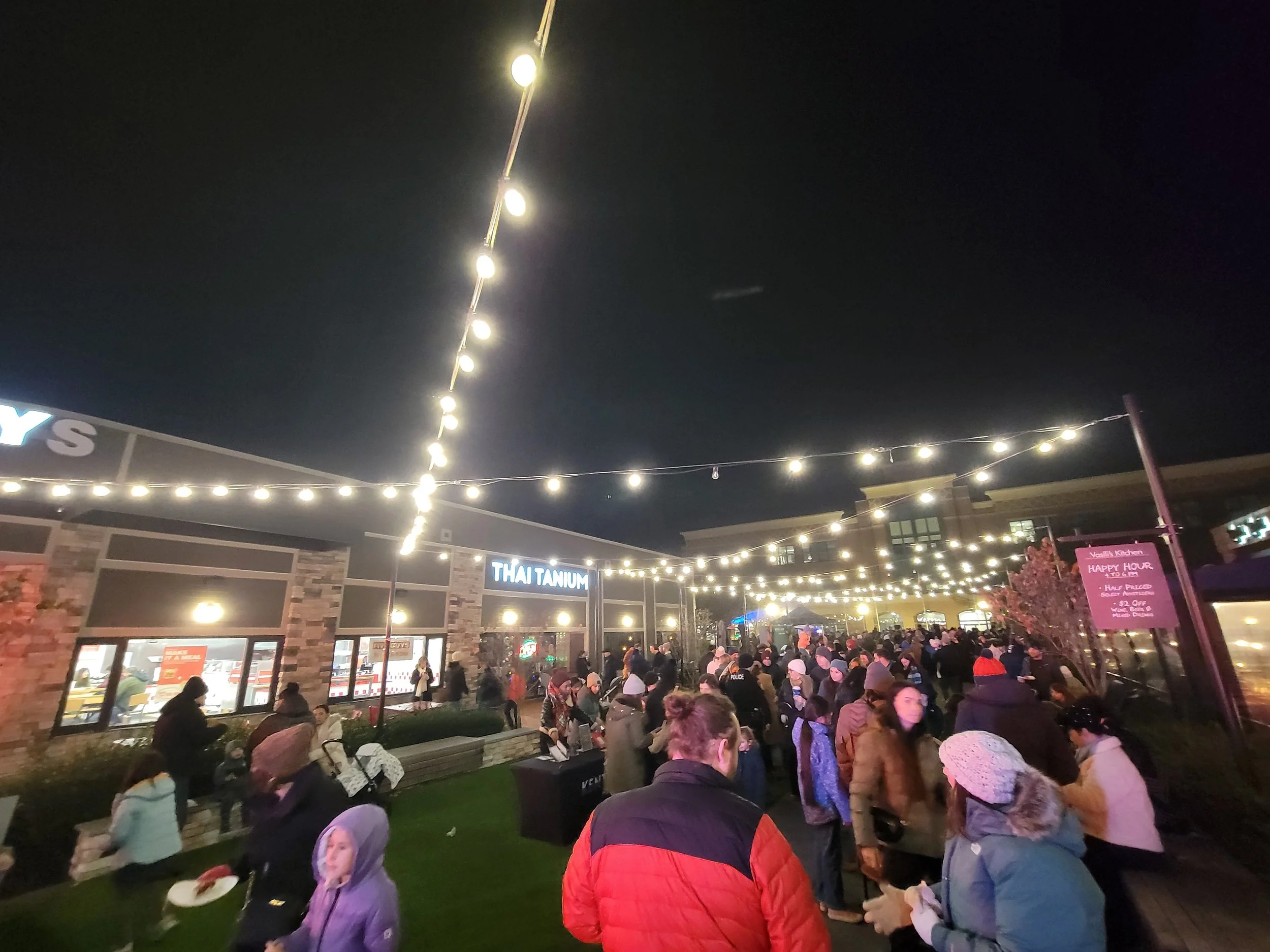 People mingling at the Tree & Menorah Lighting