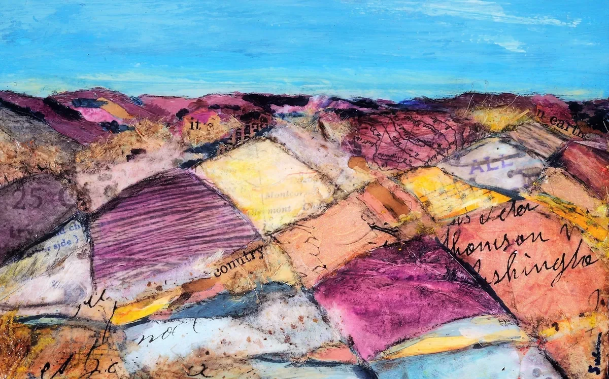 A mixed media collage of a landscape