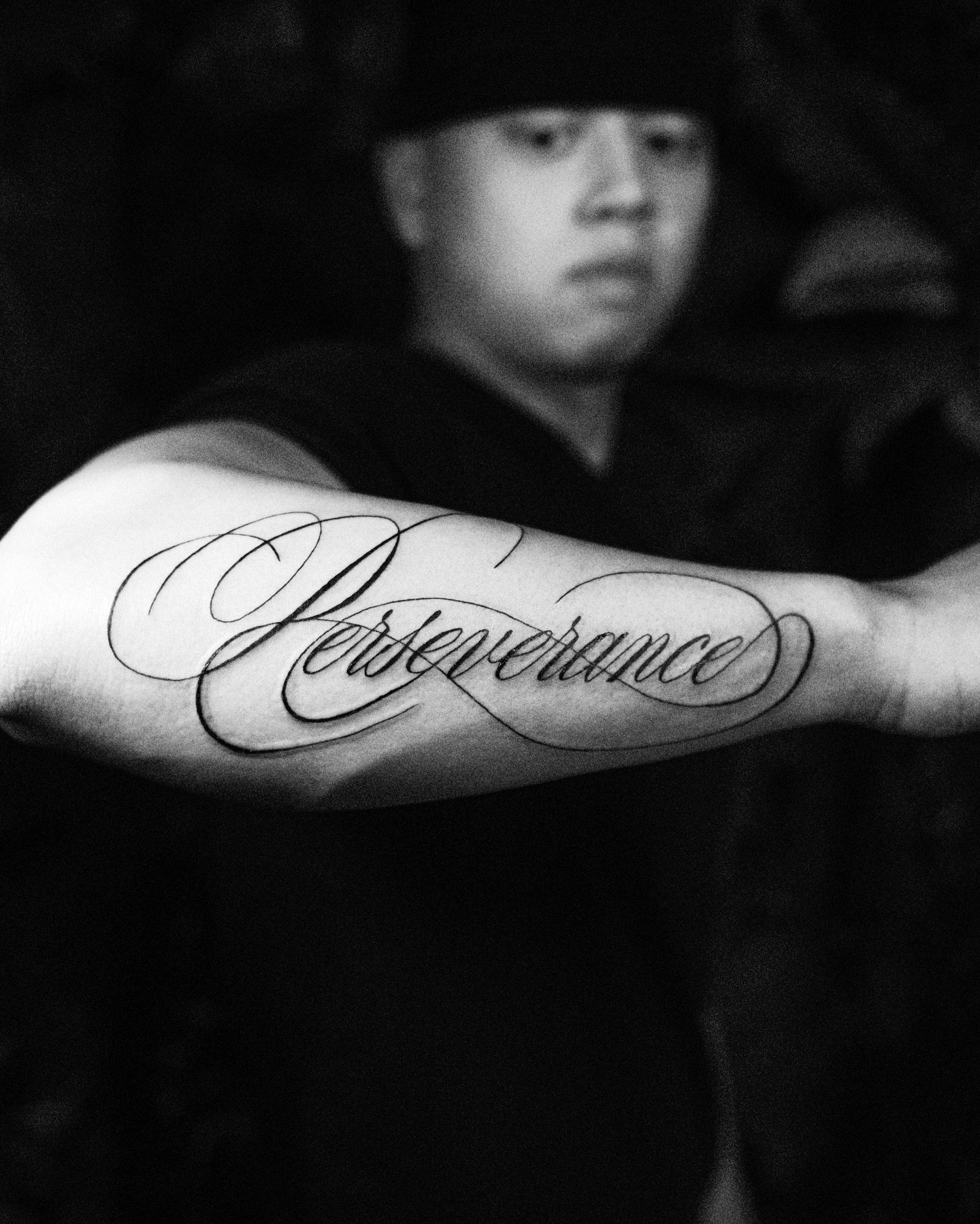 quiet ink, loud meaning.
Perseverance written like it&rsquo;s already survived something.

not just a word&mdash;
a reminder carved into motion,
to keep going even even when it&rsquo;s heavy.

this one doesn&rsquo;t fade.

Bookings &amp; Artists ⤸ (H