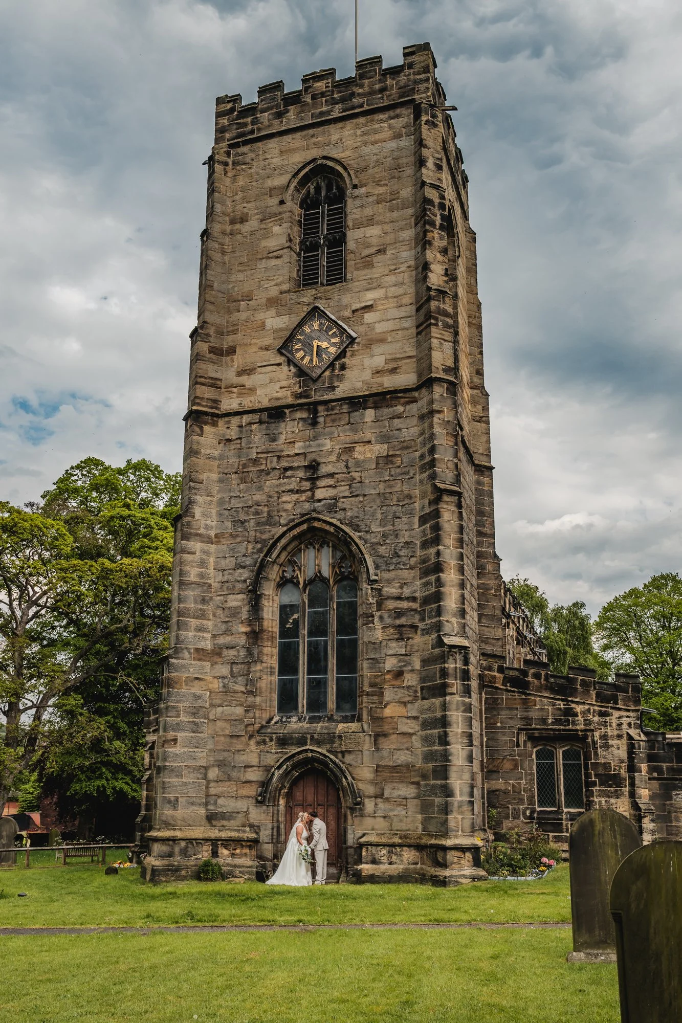 Just married couple outside the church