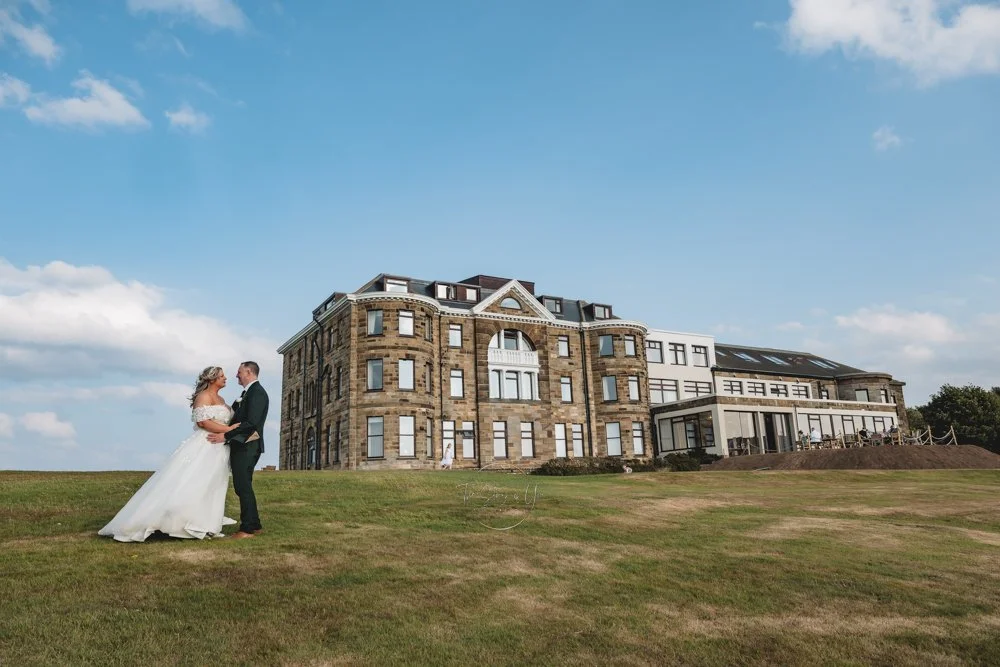 Wedding couple outside Grand Villa heights