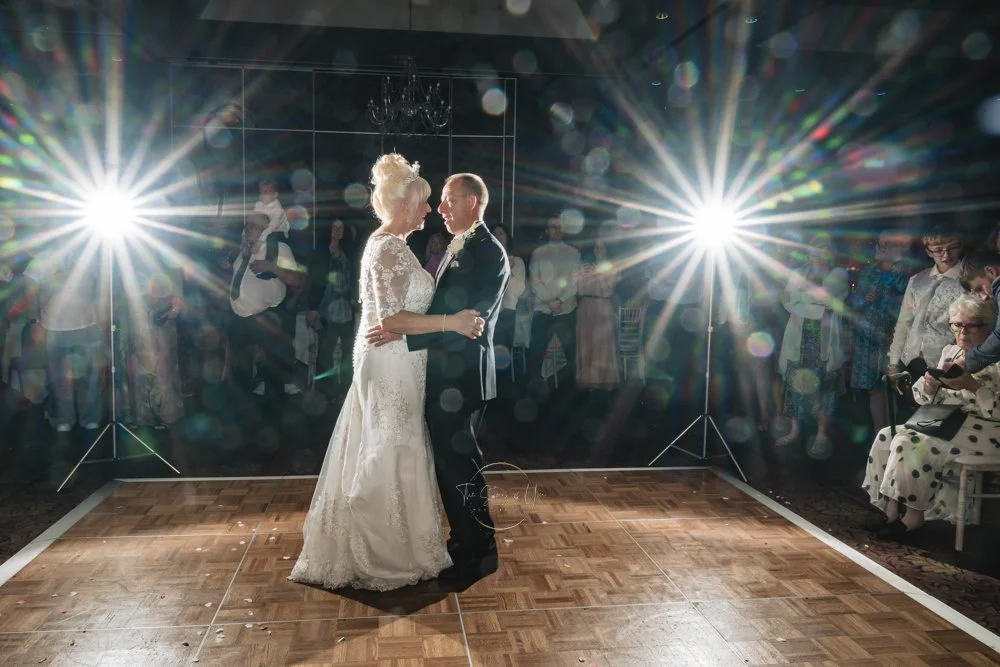 Bride and Groom on the dancefloor at Burntwood court