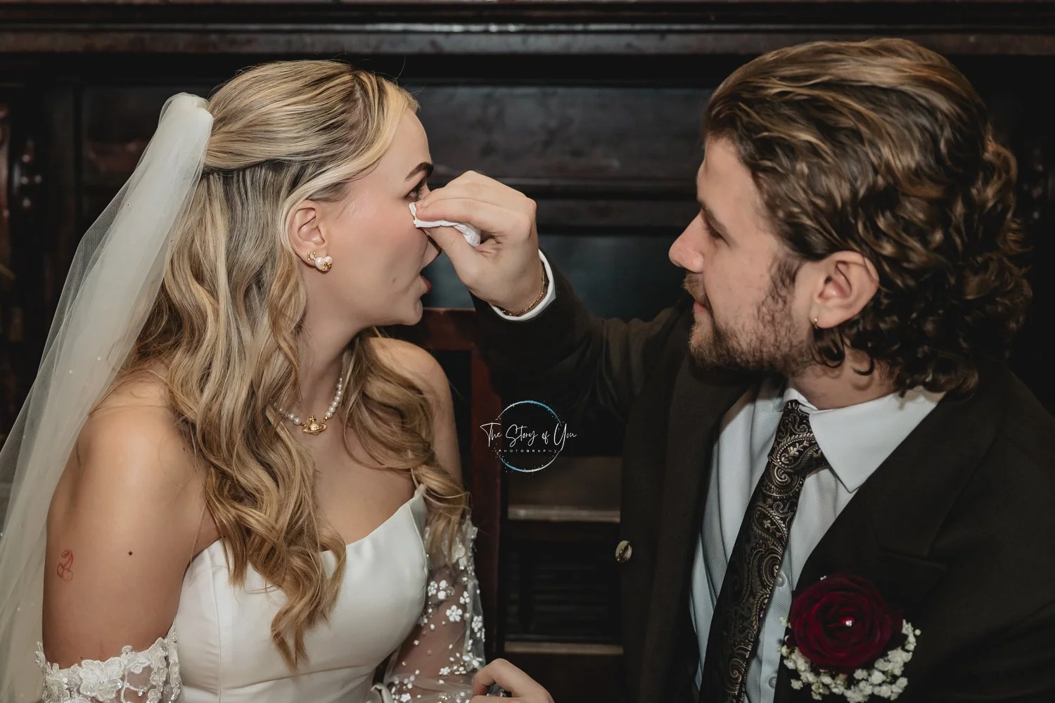 Couple wiping away the tears after the wedding at Wortley Hall in barnsley