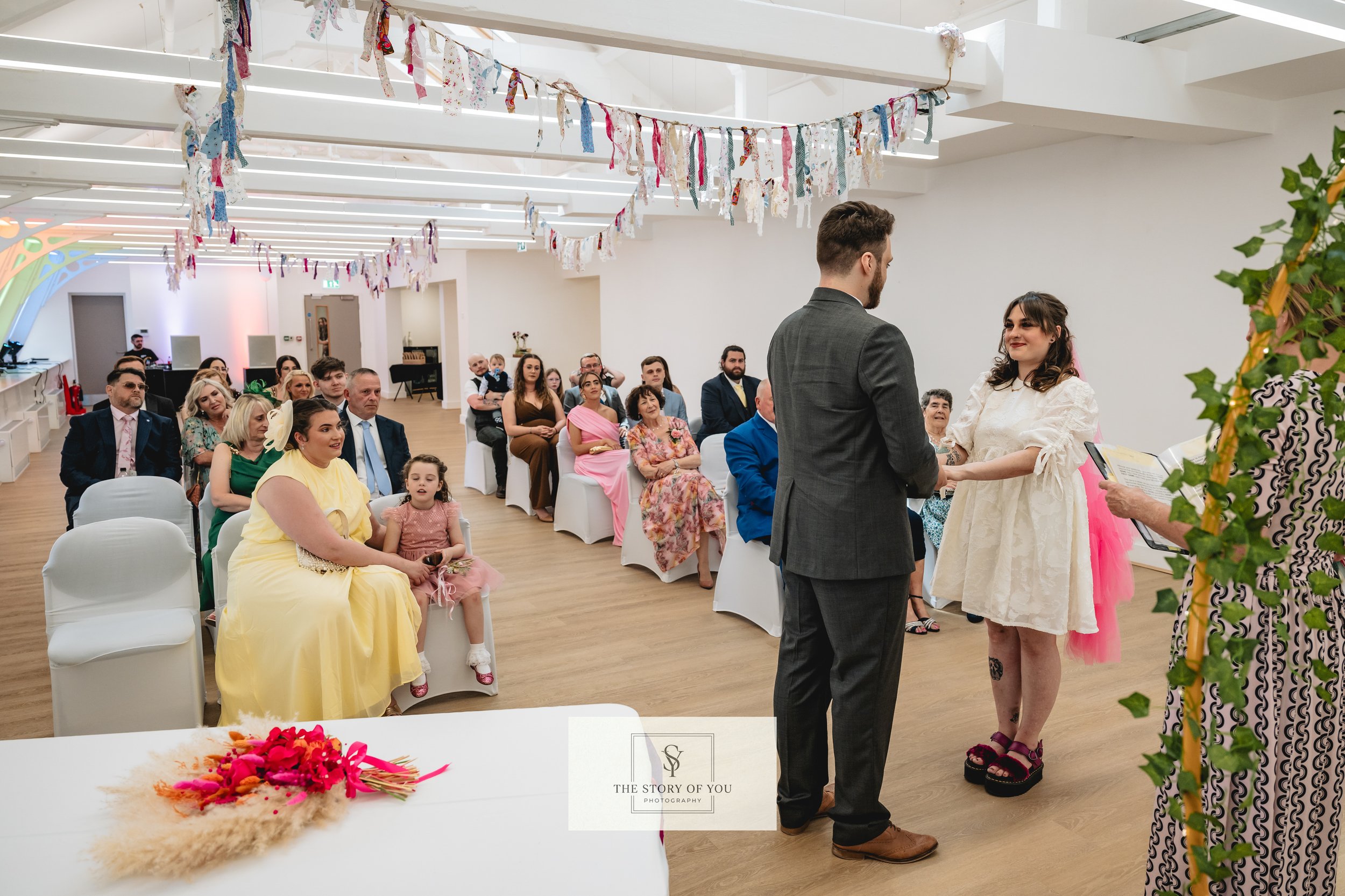 Wedding couple stood at the civic