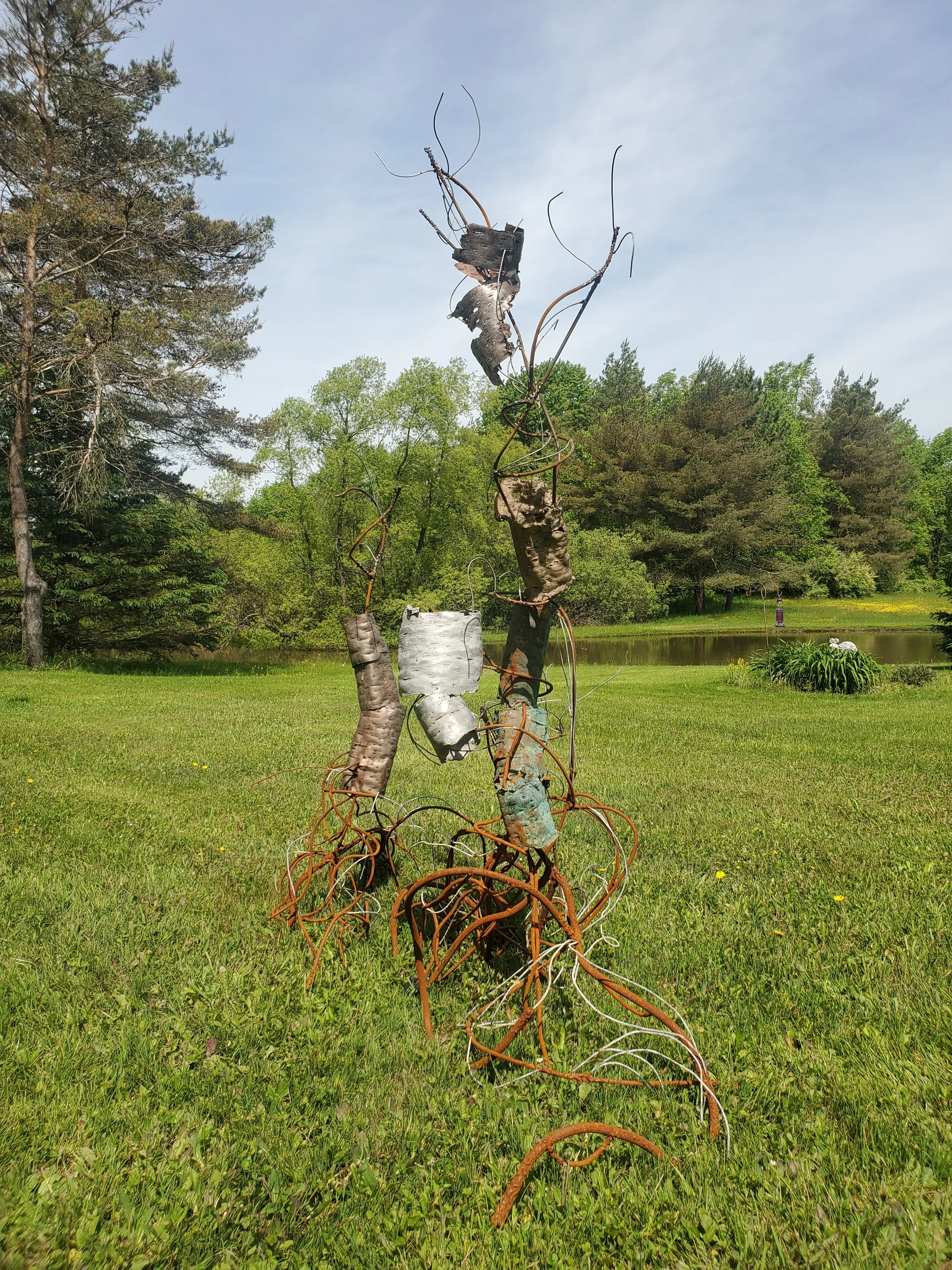 Carry on in Resemblance (Permanent Install) | 2025 | Cast Bronze and Aluminum, Round Stock, Wire, Welds, Birch Bark | 101" x 30" x 72"