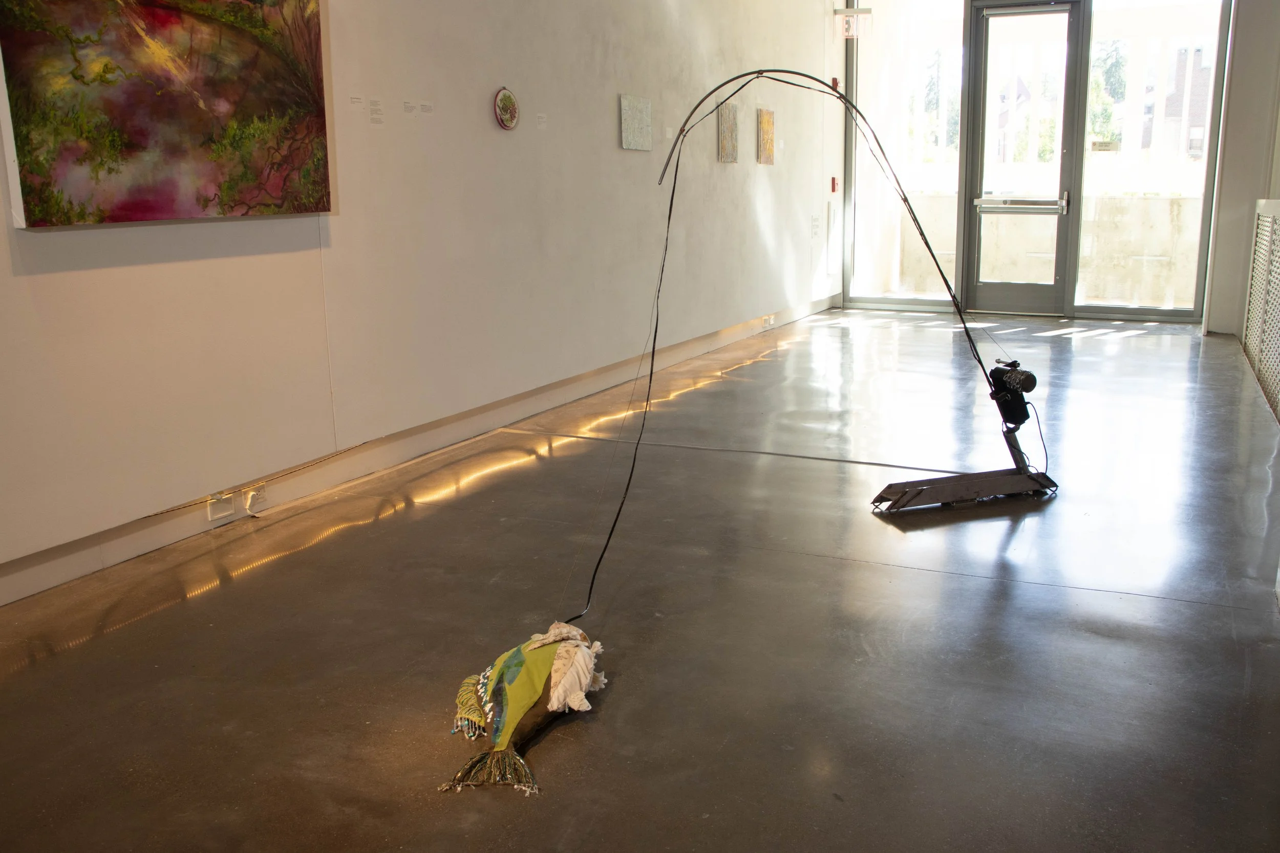 Gasping For Air
2024
Metal Sculpture, Wire, Power Box, Soft Sculpture, Fabrics, Embroidery Thread, 3D Printed Scales, Beads, Chain, Arduino Code with 2 Servos
113 in l x 59 in h x 40 in w