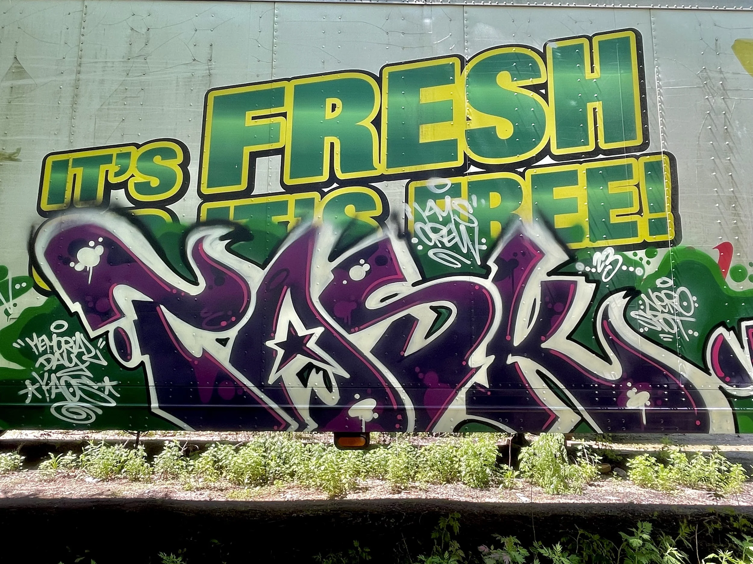 large bold graffiti mural on shipping container