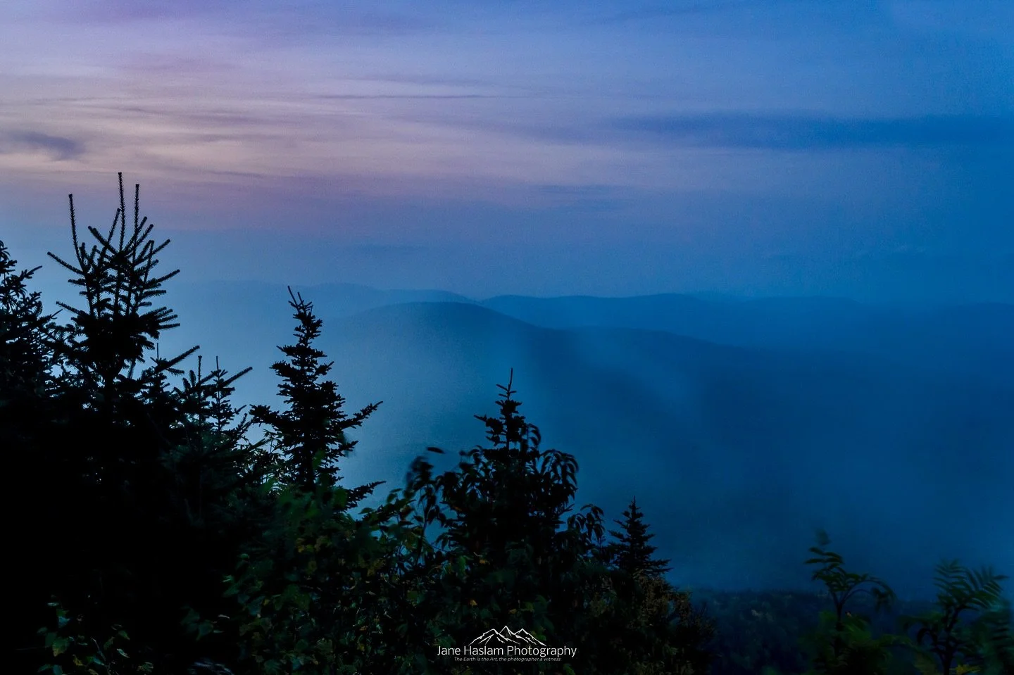I always love a beautiful blue hour&hellip;. This was Monday evening on Slide Mountain in the Catskills. The view is North - hence the lighter sky on the left of the image - The mountain was making its own weather as the air cooled so with the wind c