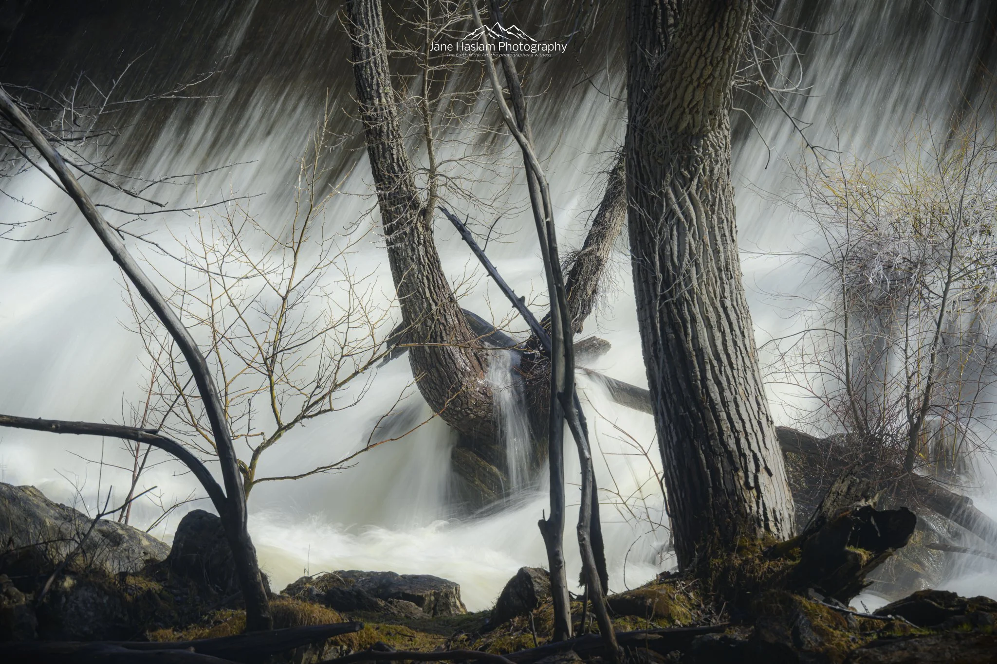 Rushing spring meltwater over granite rocks at Bulls Bridge on the Housatonic River, Connecticut