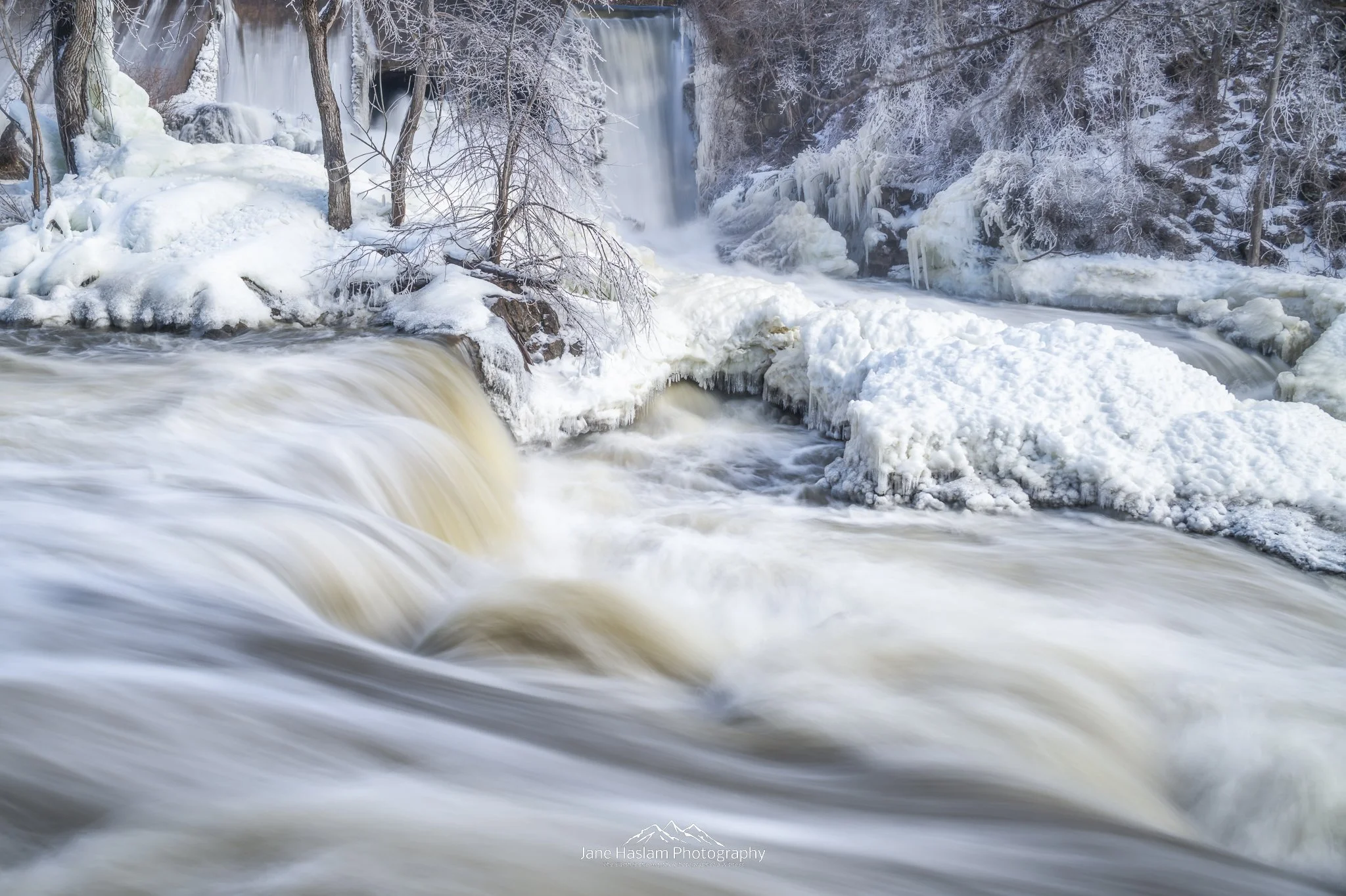 Unseasonal Winter weather created heavy thaw conditions and this tumultuous flow of meltwater on the Housatonic River at Bulls Bridge in Connecticut. CT