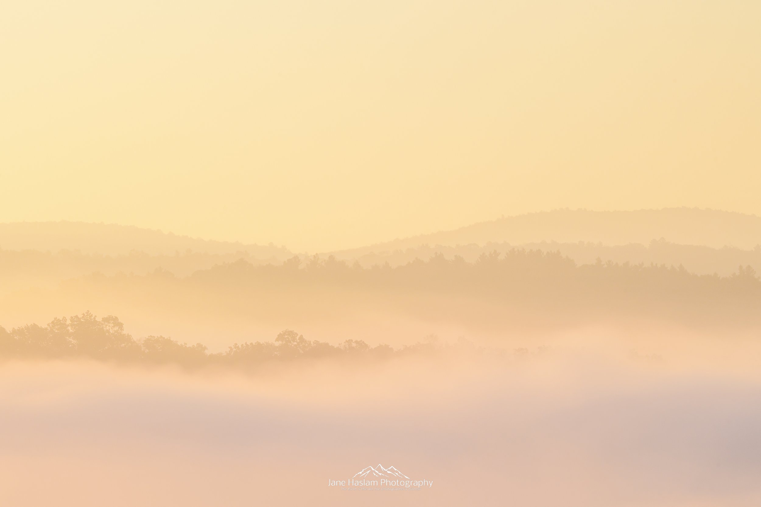 Islands in the sky at sunrise above the Housatoniv Valley in West Cornwall Connecticut