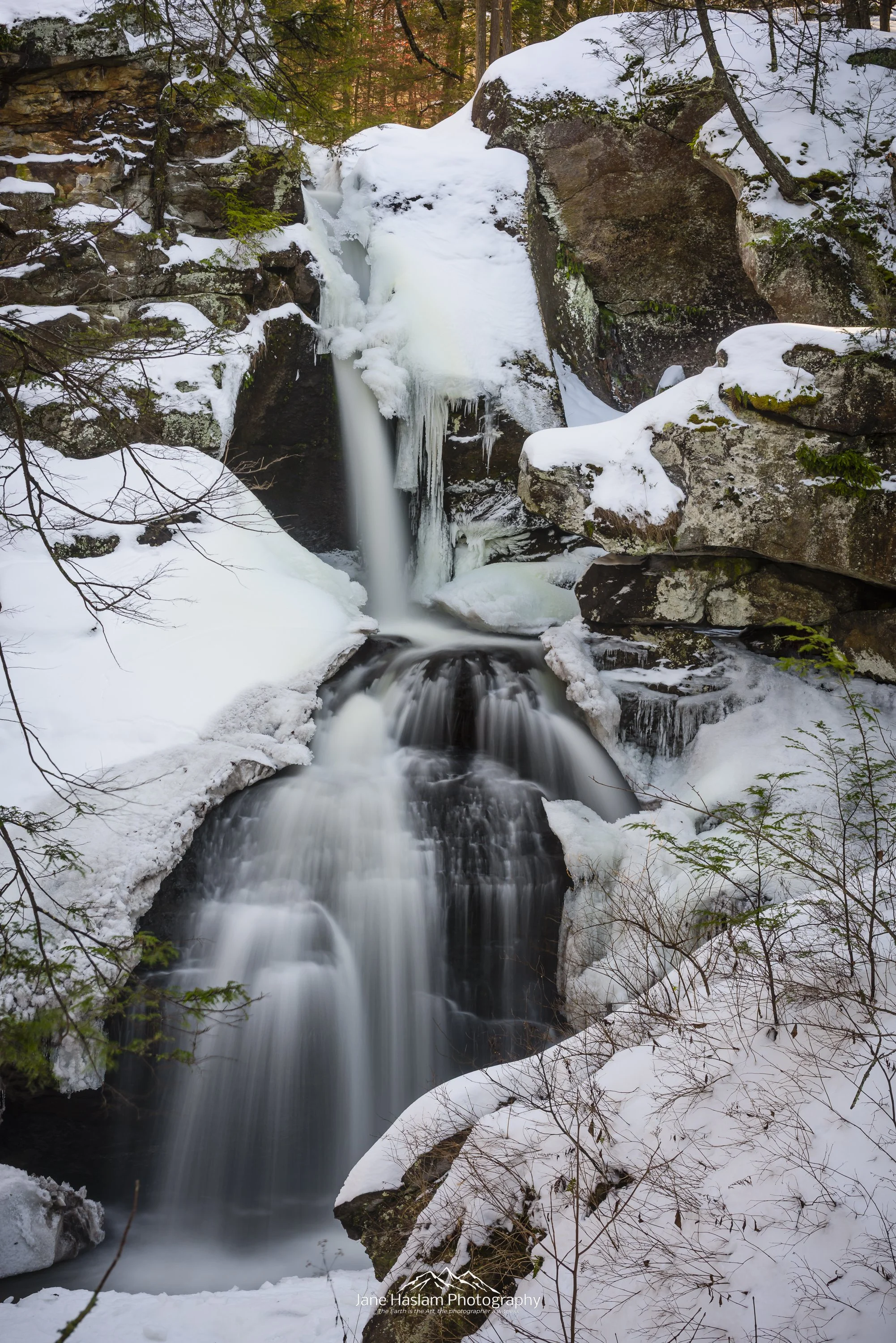 Winter's Icy Grip: A heavy December snowfall turns the upper falls at Kent into a Winter wonderland. Kent Falls, Western Connecticut