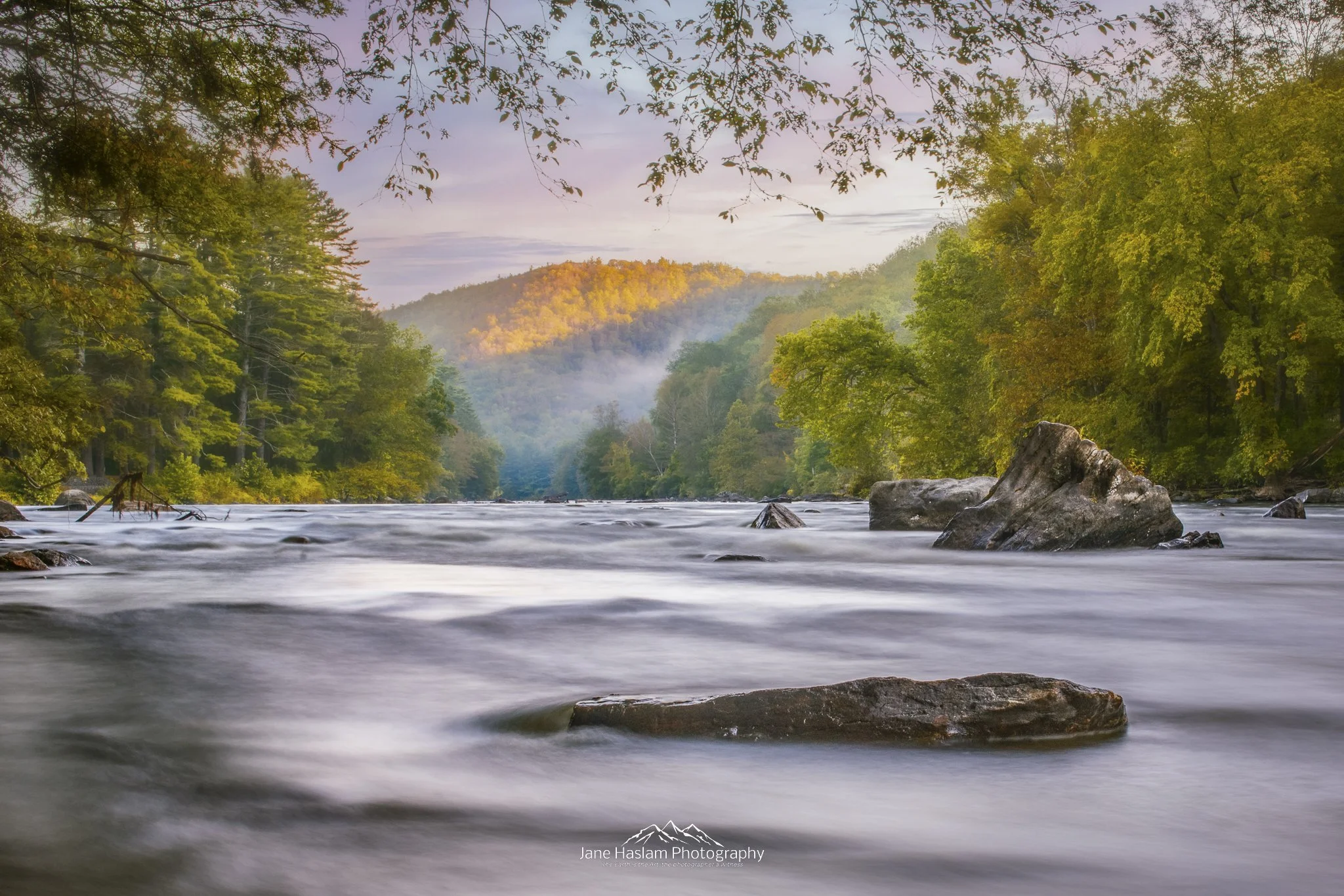Sunrise Flow:  Remnants of a morning mist as Summer turns to Fall on The Housatonic River at Cornwall Bridge  in Western Connecticut