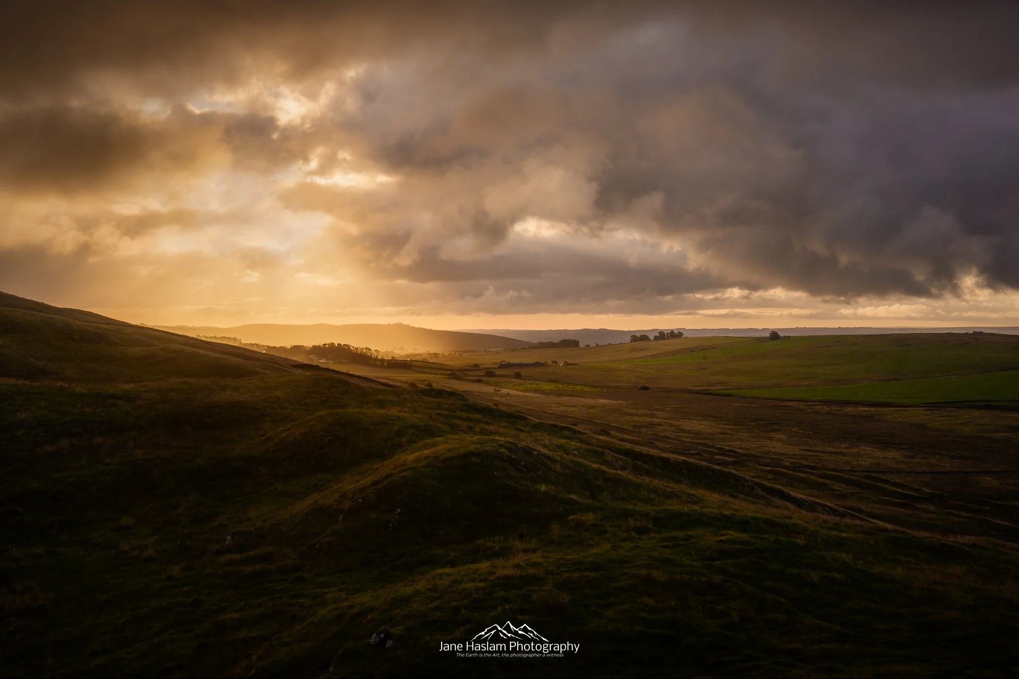 Atlantic weather meets Pennine light. A break in the clouds shortly after sunrise near Cawfield on Hadrians Wall in Northumberland