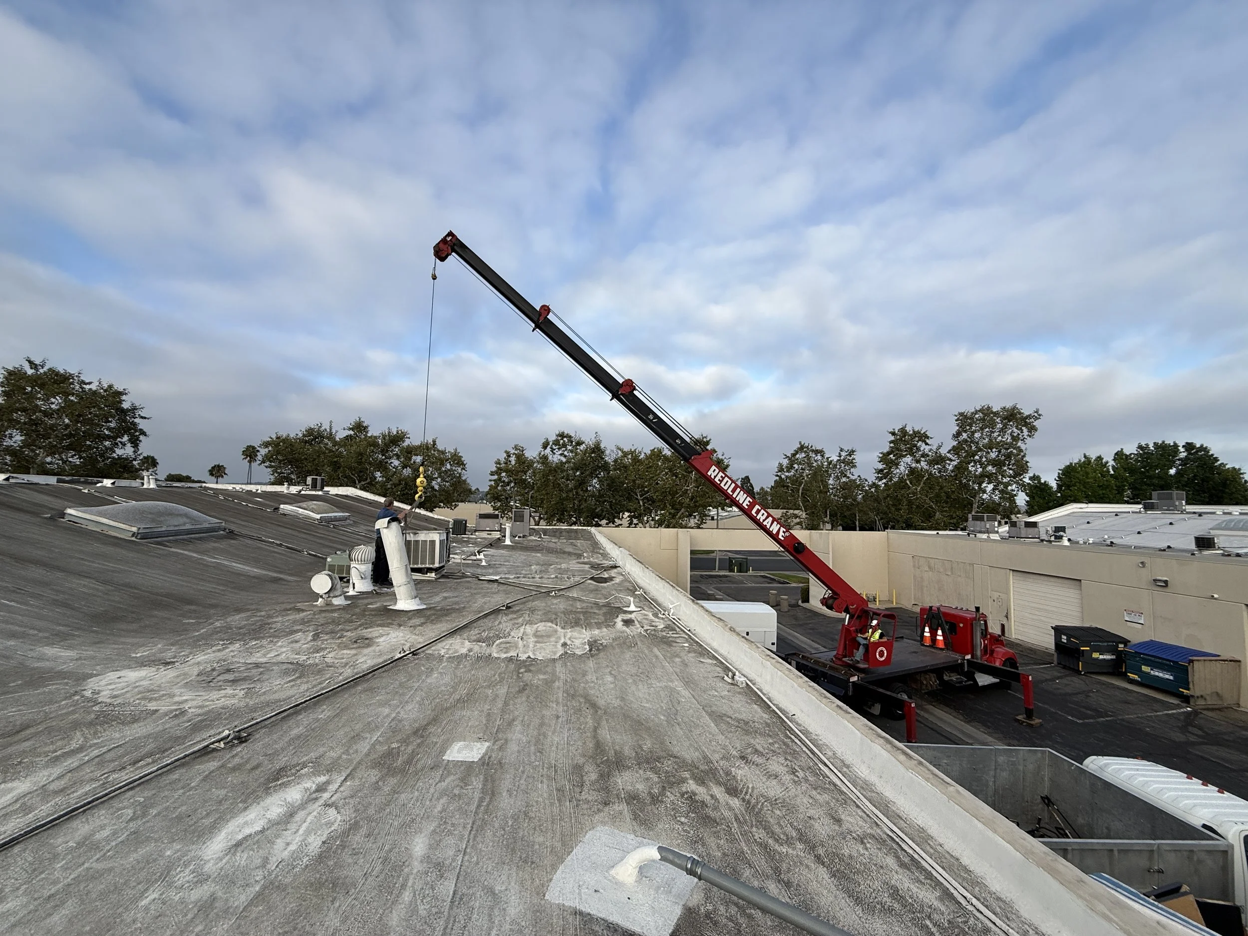 Crane brought out for our package unit installation.