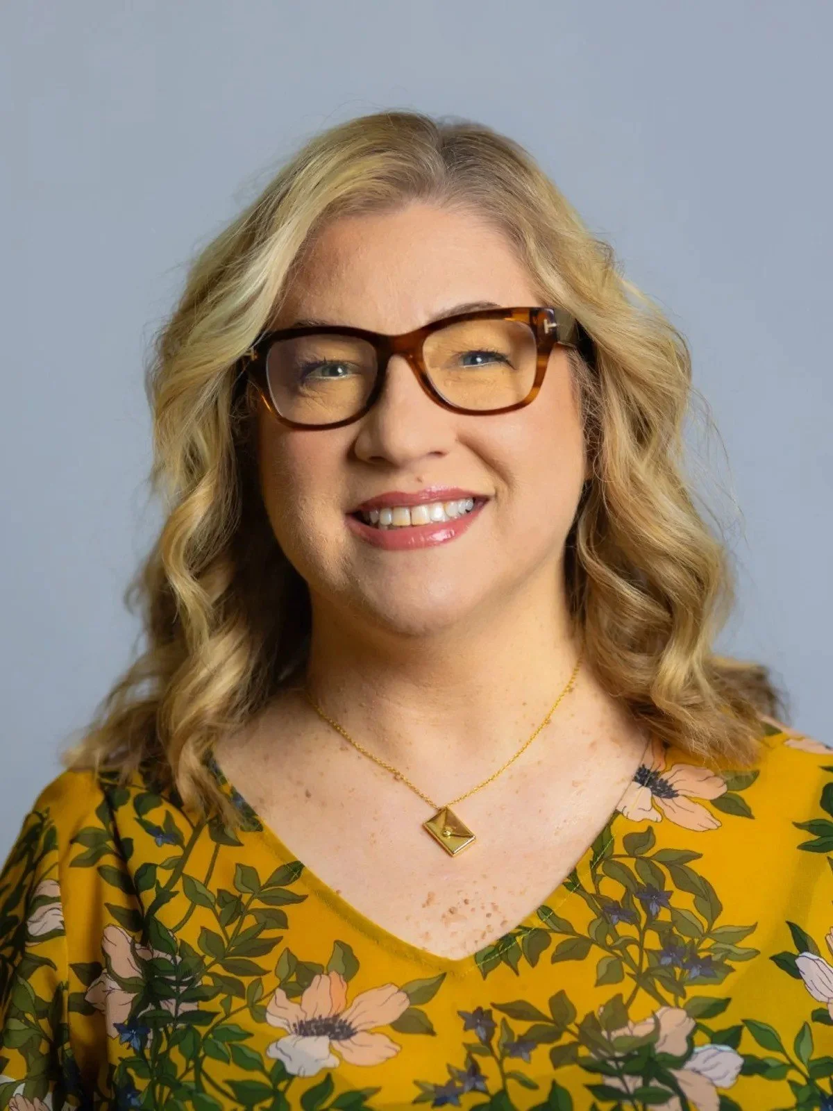 Smiling woman wearing glasses