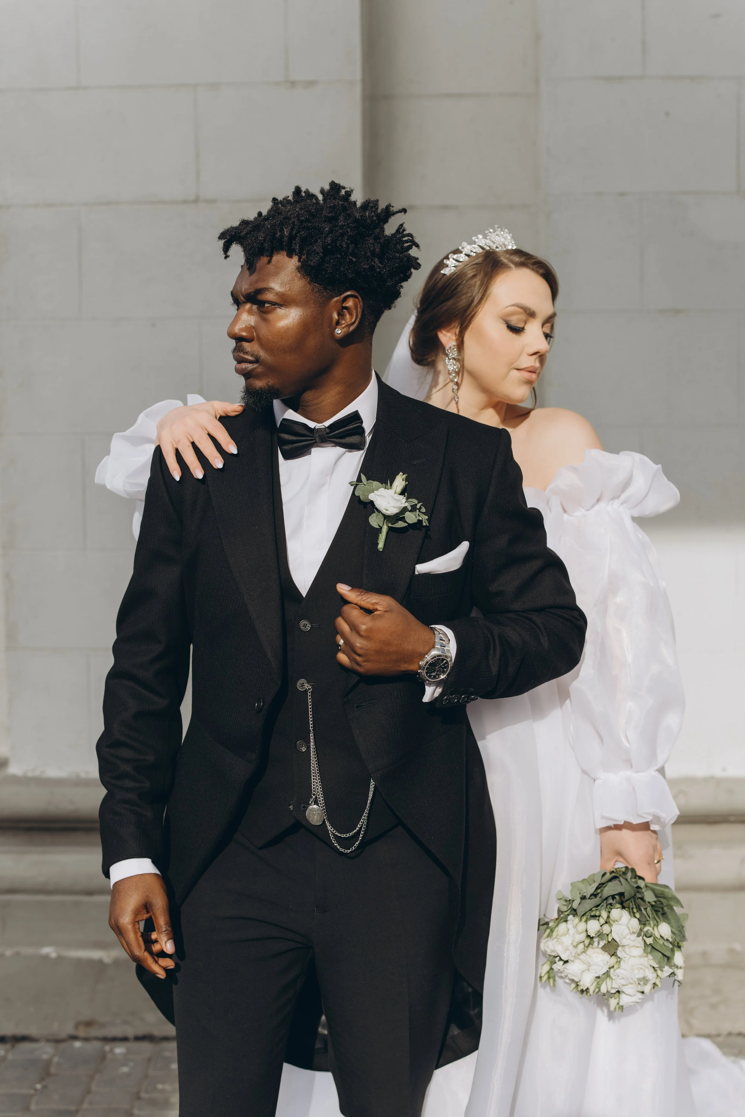 Elegant Interracial Couple Posing during Their Wedding Day.jpg