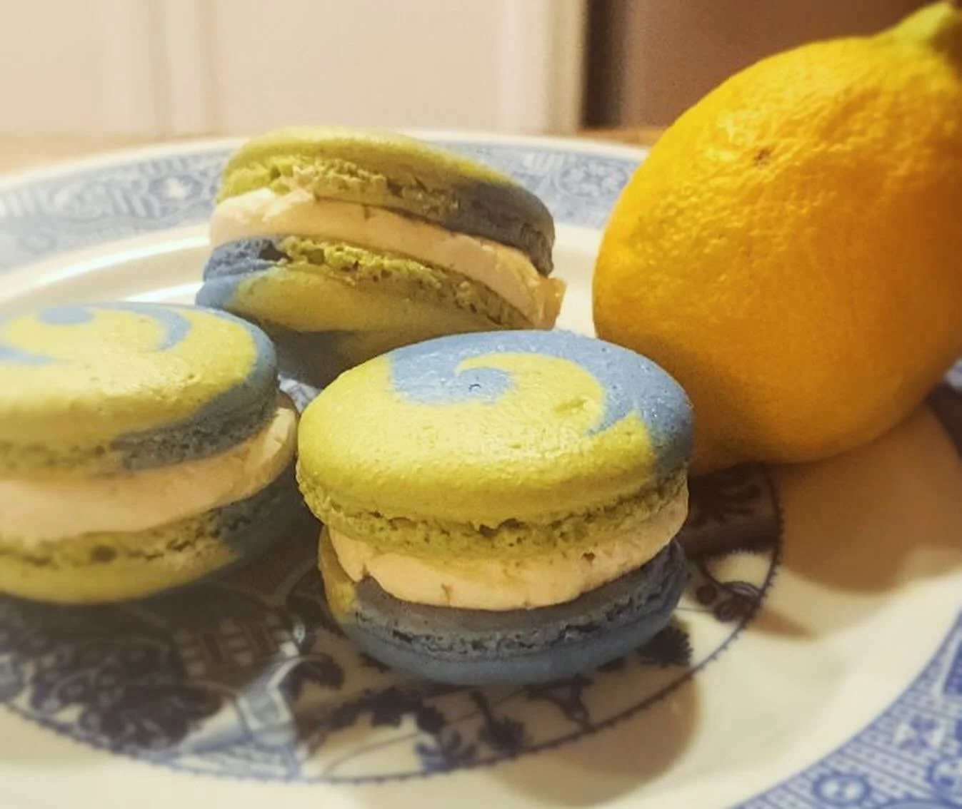 We will be selling our fan-favorite lemon curd macaron at the Healing Arts Festival &amp; Market this Sunday, October 13! These beautiful cookies are naturally colored with spirulina and matcha. Can&rsquo;t wait to see you there! 💚💙💛 #macarons #ma