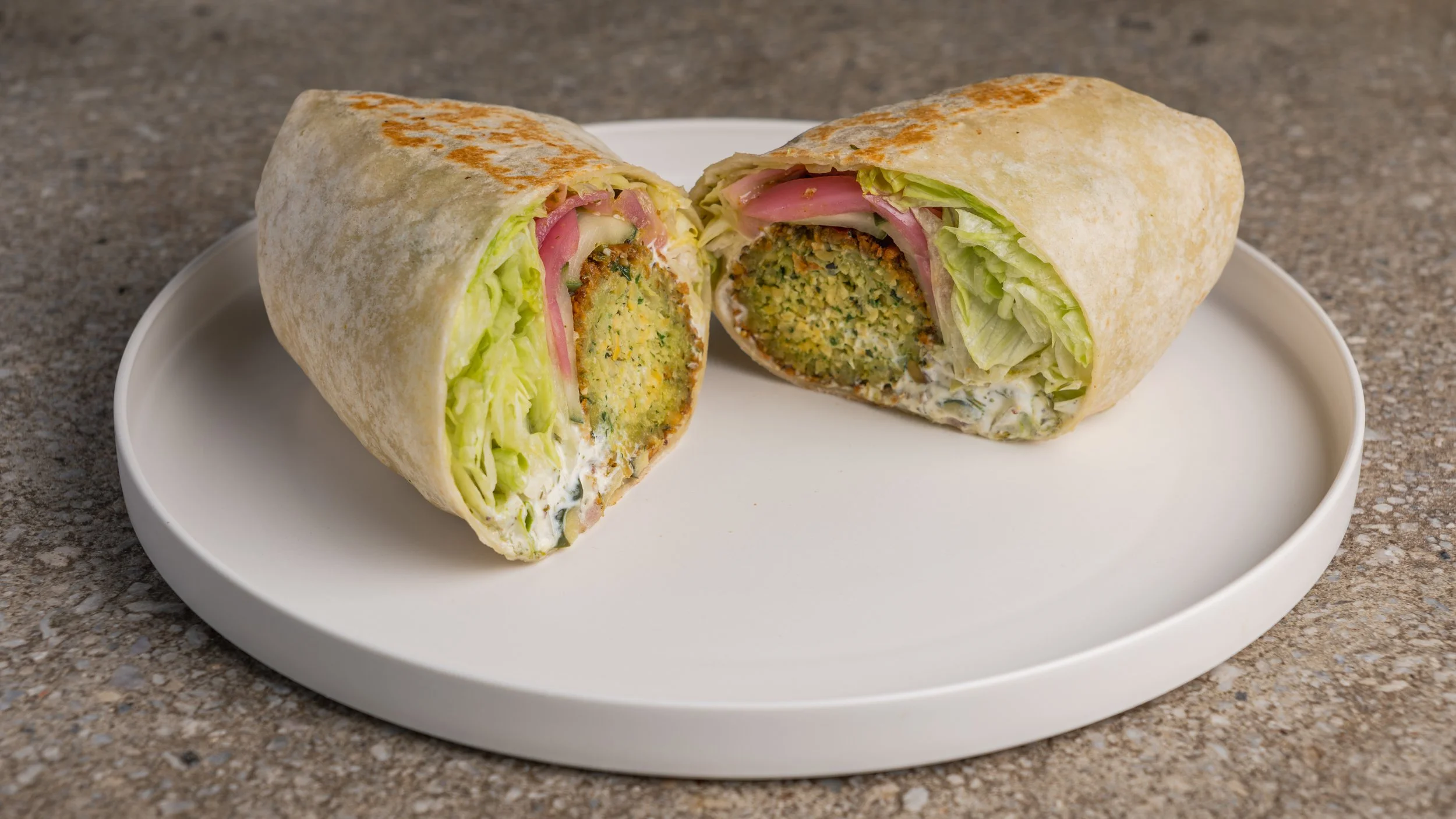 Toum, Zatar, Pickled Onion, Lettuce, Tzatzki, Salsa Verde, Quick Cucumbers