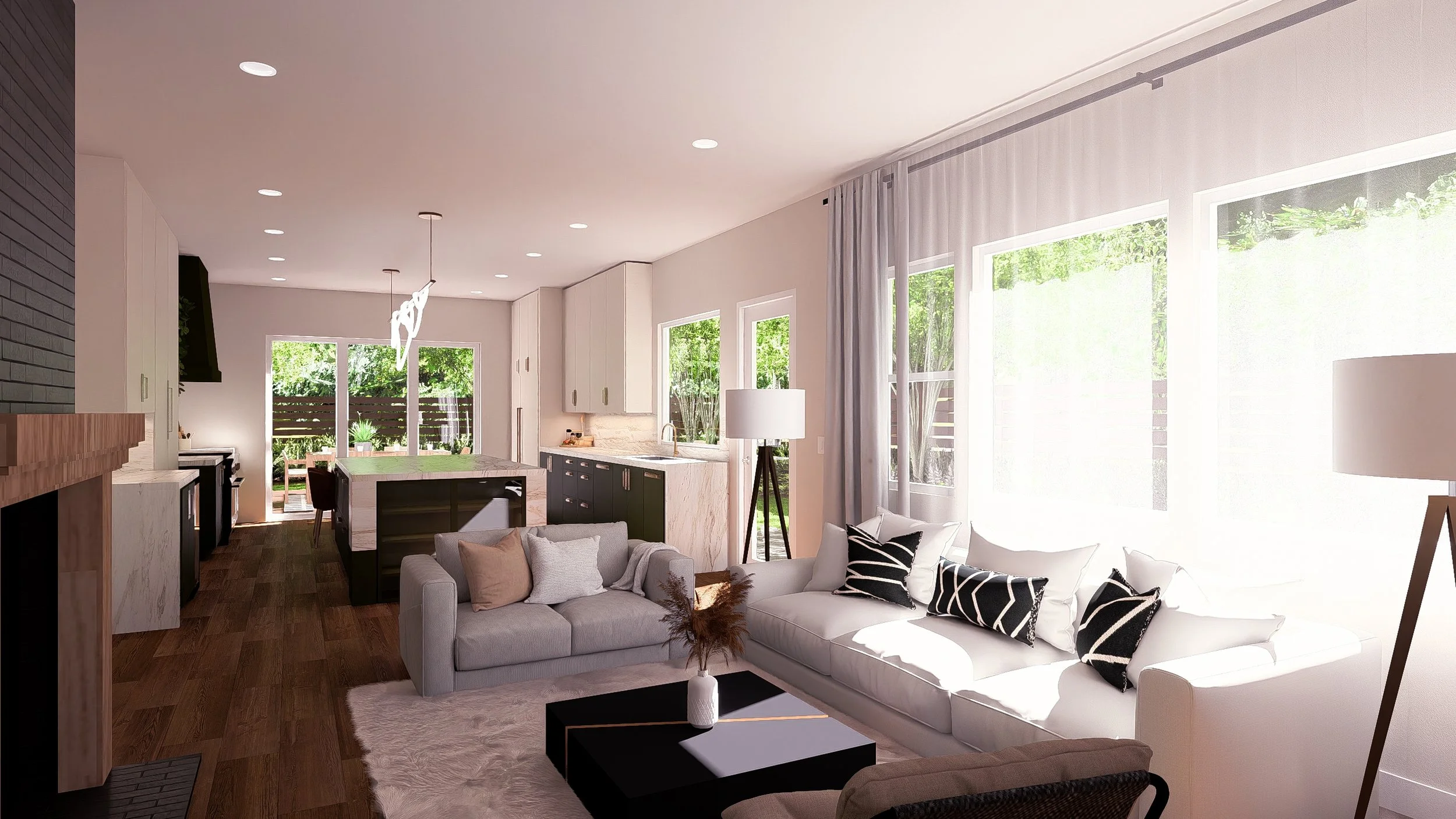 Open-plan living room and kitchen with white and black cabinetry, large windows with sheer curtains, a white sofa with black and white pillows, a rectangular black coffee table with a vase, a floor lamp, and sliding glass doors leading outside to a garden.