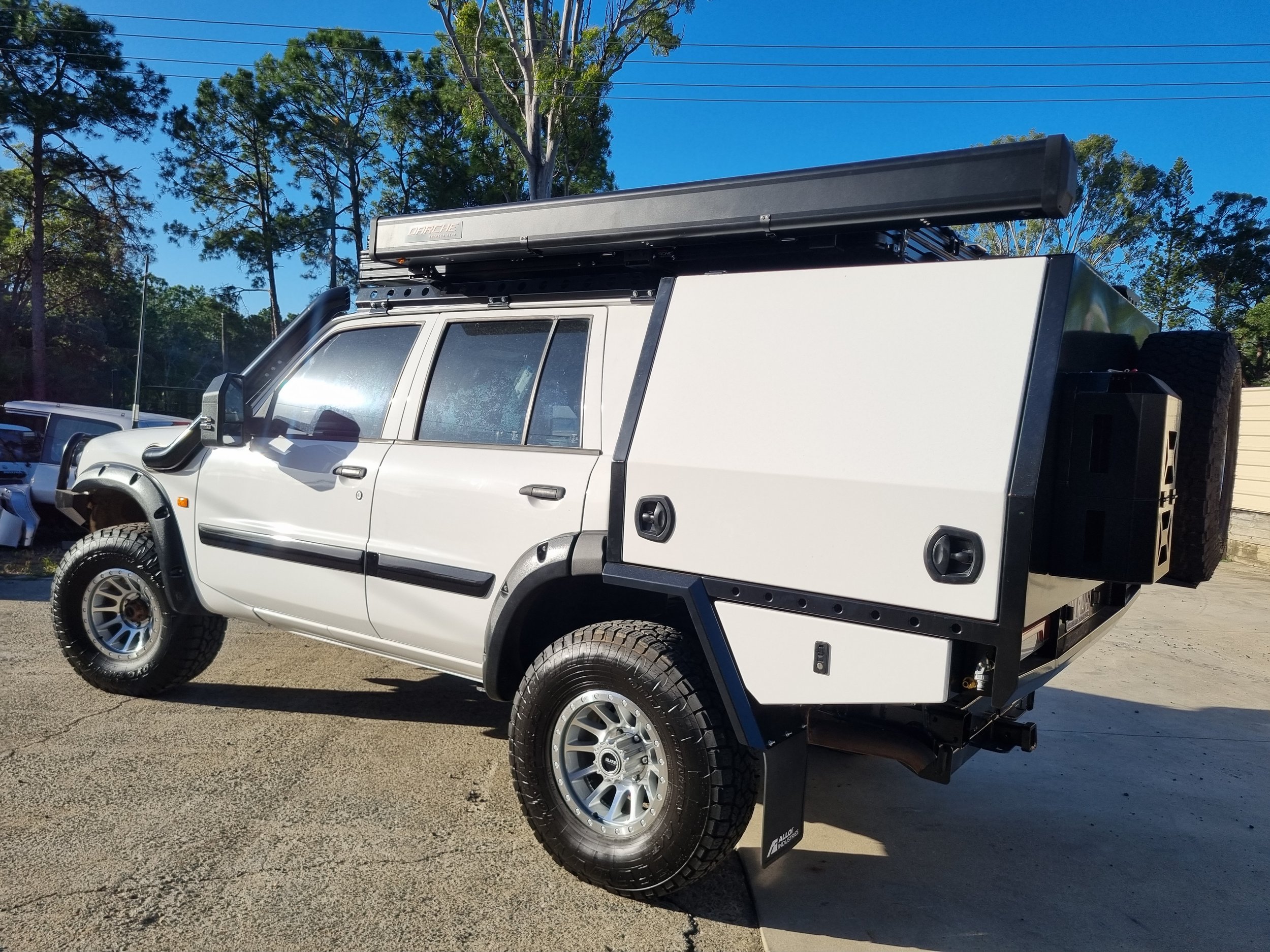 A full touring setup for life on the road. Includes ute conversion, chassis-mounted canopy, custom roof rack and little fabrication details that make this a great full-time tourer