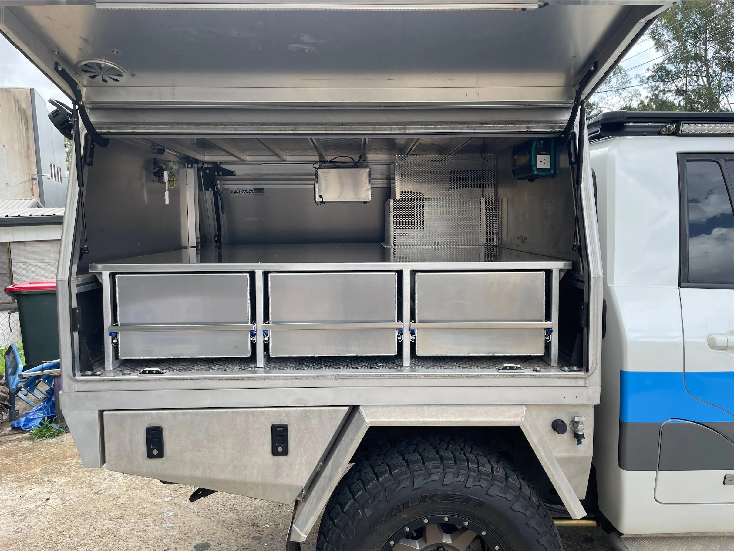 Canopy with internal draws for storage