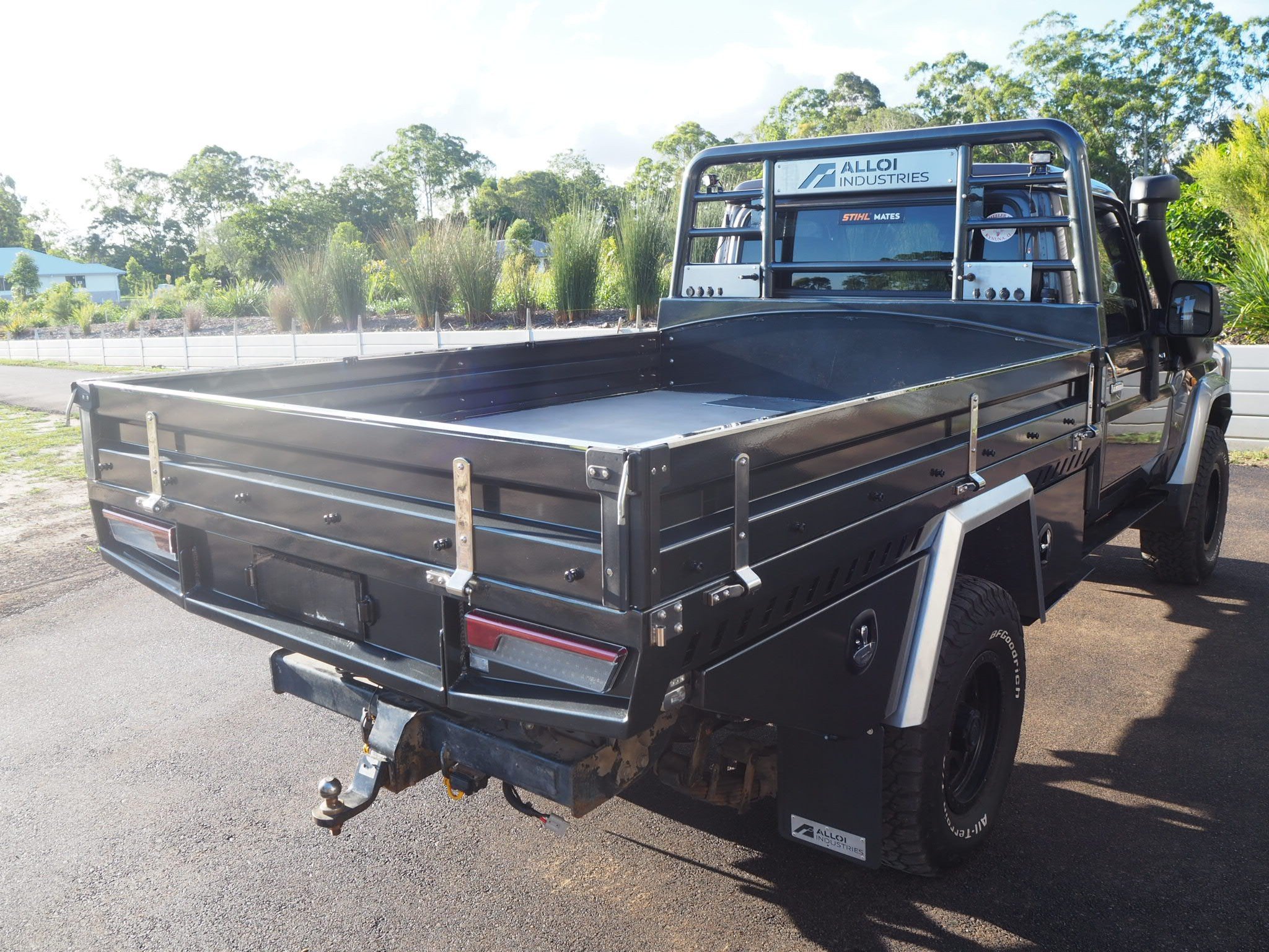 Heavy-duty aluminium ute tray with toolboxes and features for touring for a 79 series Landcruiser