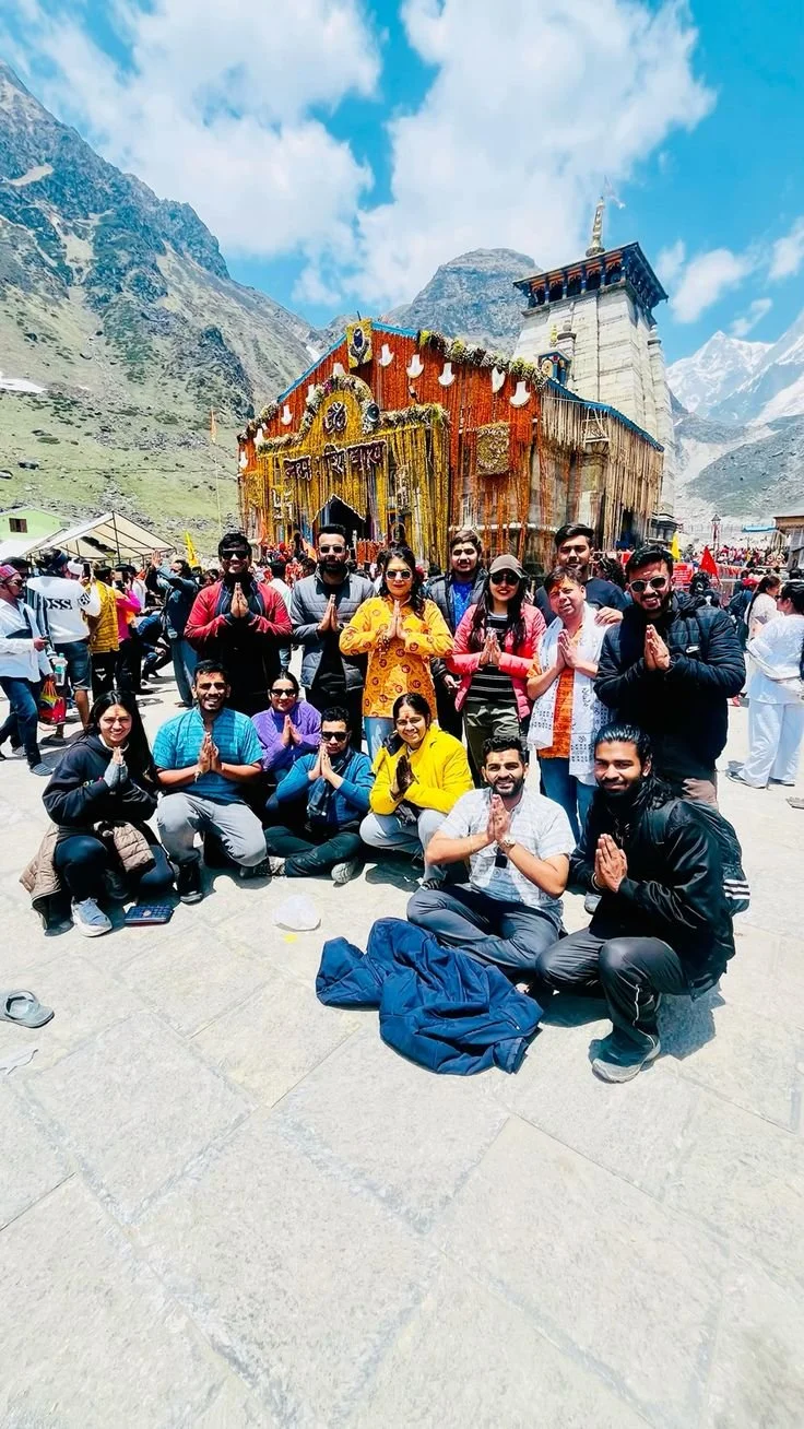Image of Badrinath Temple – Colorful Badrinath Temple with mountain backdrop during Yatra