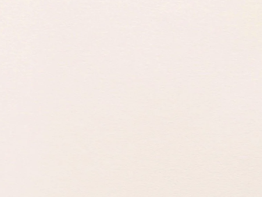 Una parete di colore chiaro con una leggera texture