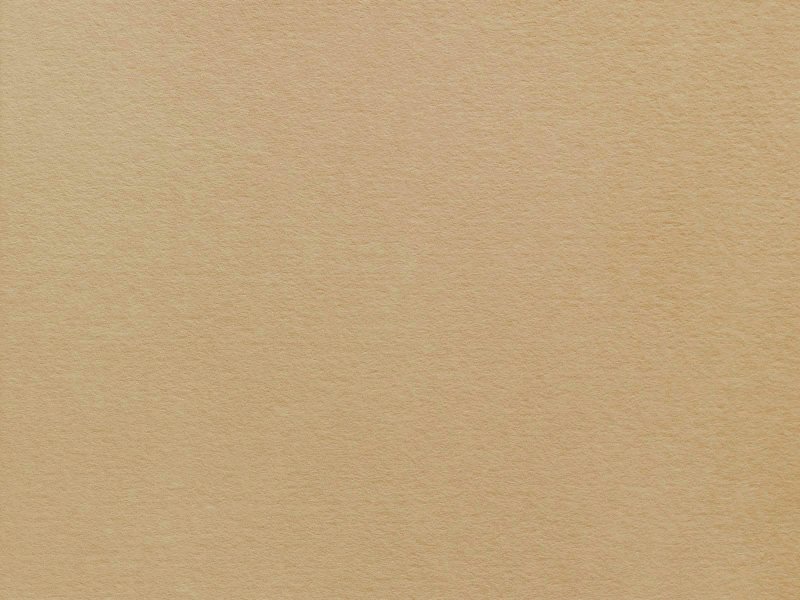 Superficie liscia di colore beige sterile.