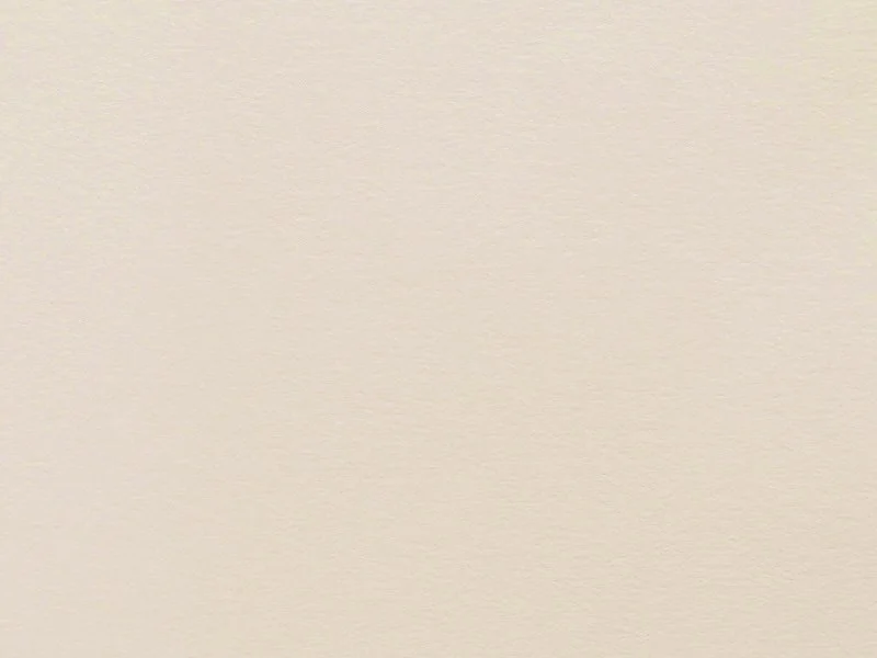 L'immagine mostra una parete di colore beige chiaro.