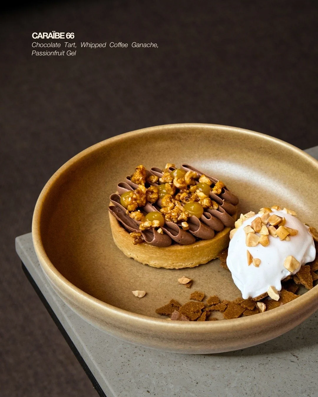 A tart built around Valrhona Cara&iuml;be 66%, one of pastry chefs&rsquo; most cherished chocolates.

Known for its balanced cocoa profile, with notes of roasted dried fruit, toasted nuts, and a hint of oak, Cara&iuml;be is paired with whipped coffee