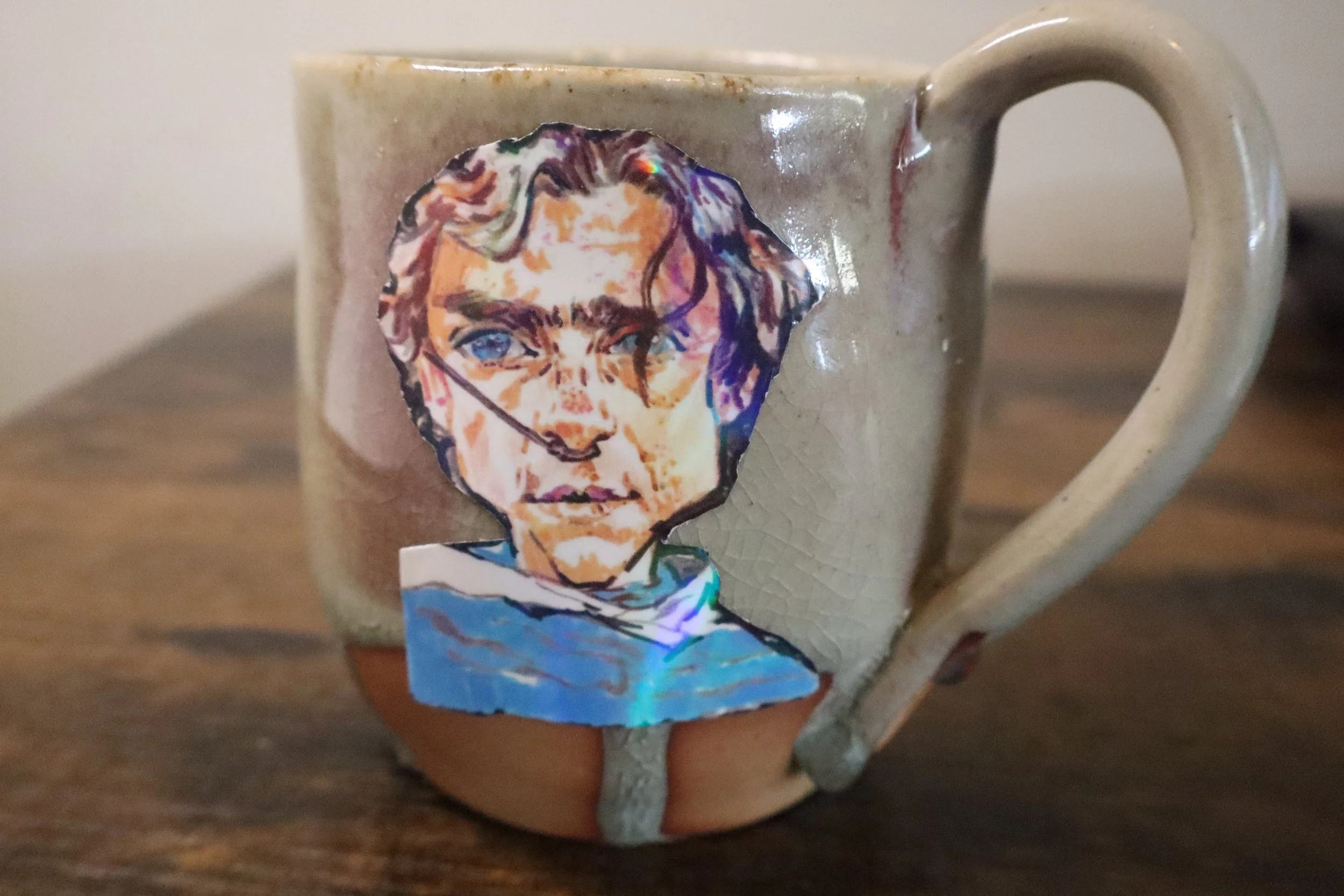 Into the sand.'' Caricature sticker