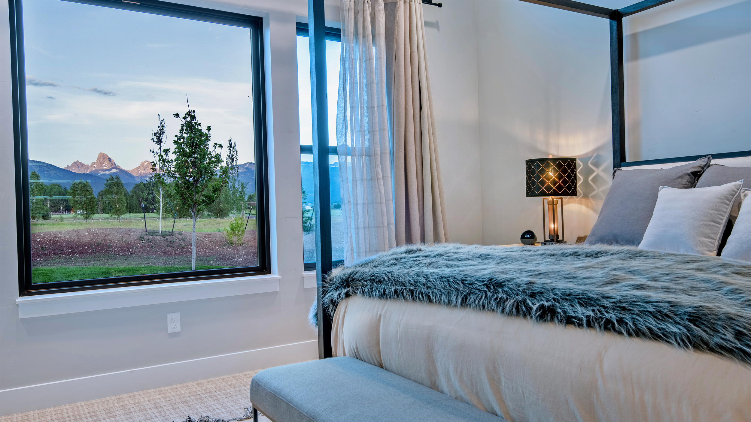 Master Suite with soaring cathedral ceilings and mountain views at Driggs vacation estate near Grand Targhee Ski Resort