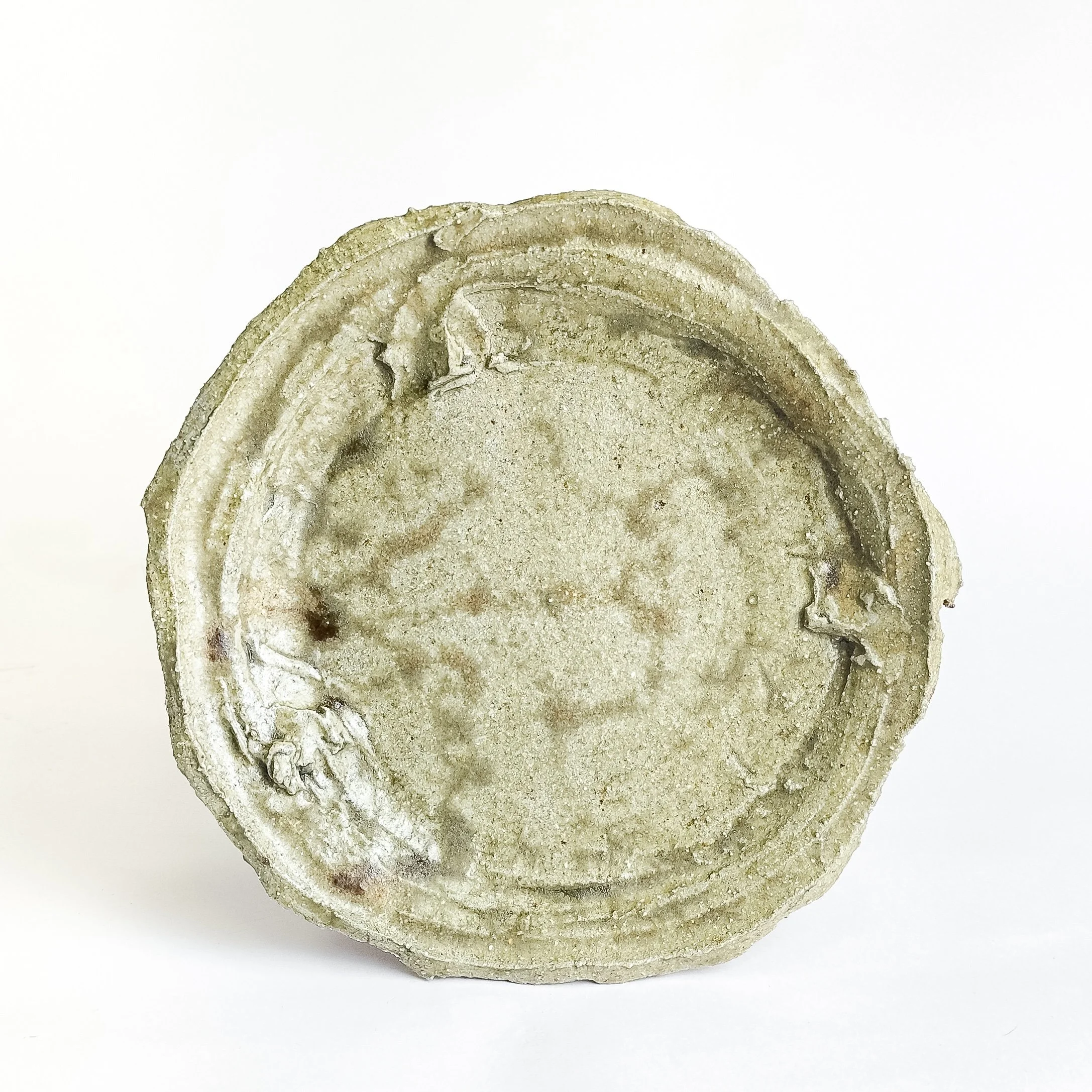 plates: organic shapes, collected materials