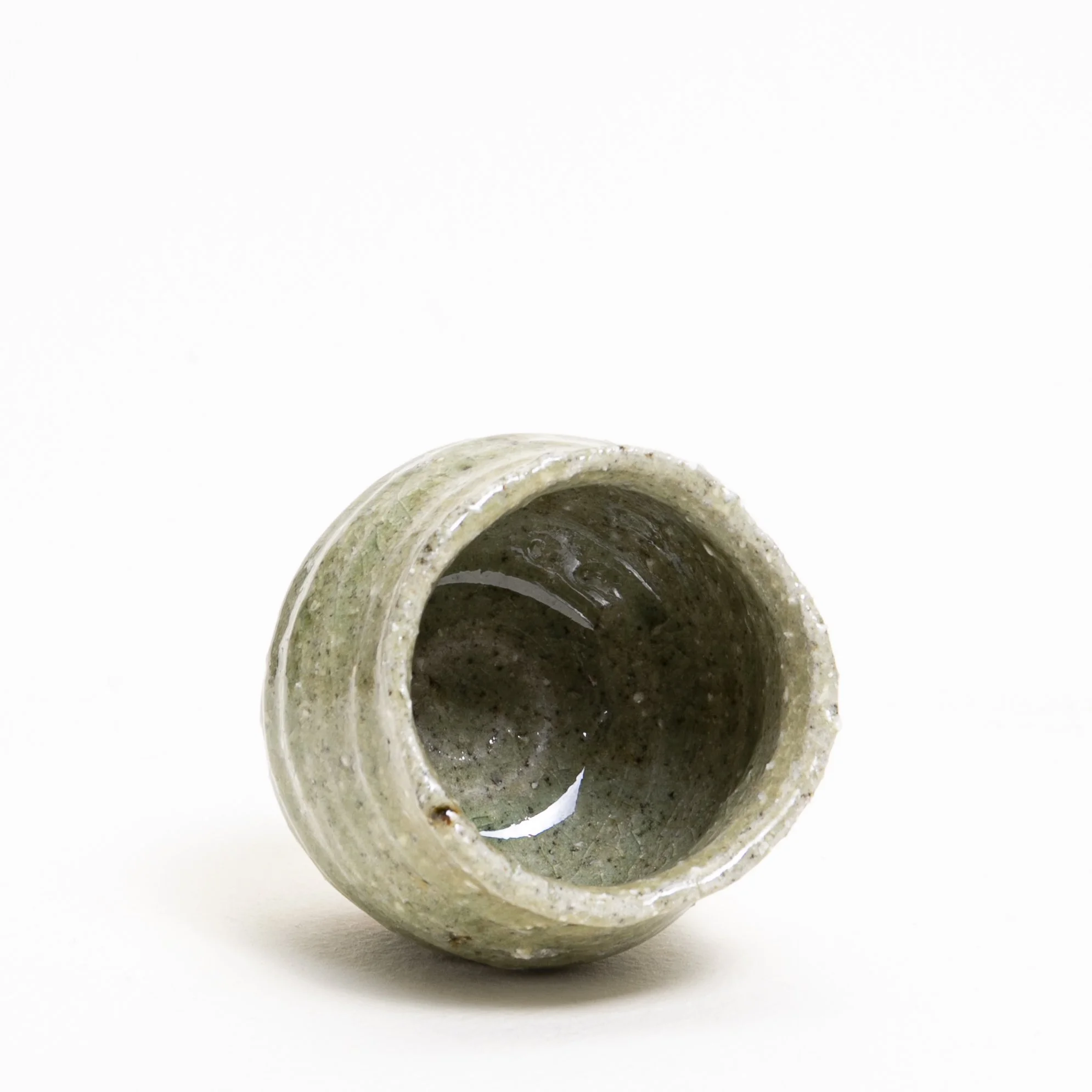 river cup wild clay ash glaze interior