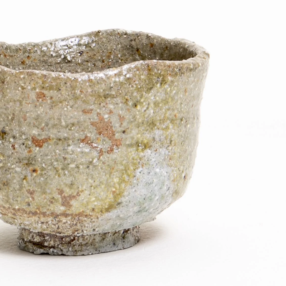 past cup wild clay ash glaze detail