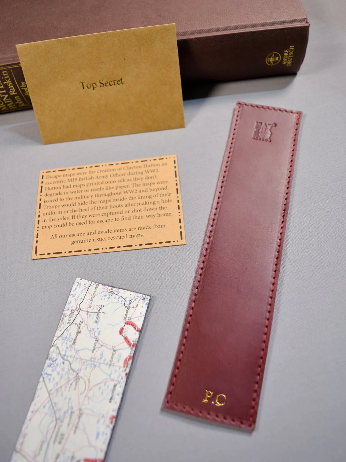 natthakur-wine-red-leather-escape-map-bookmark.jpg