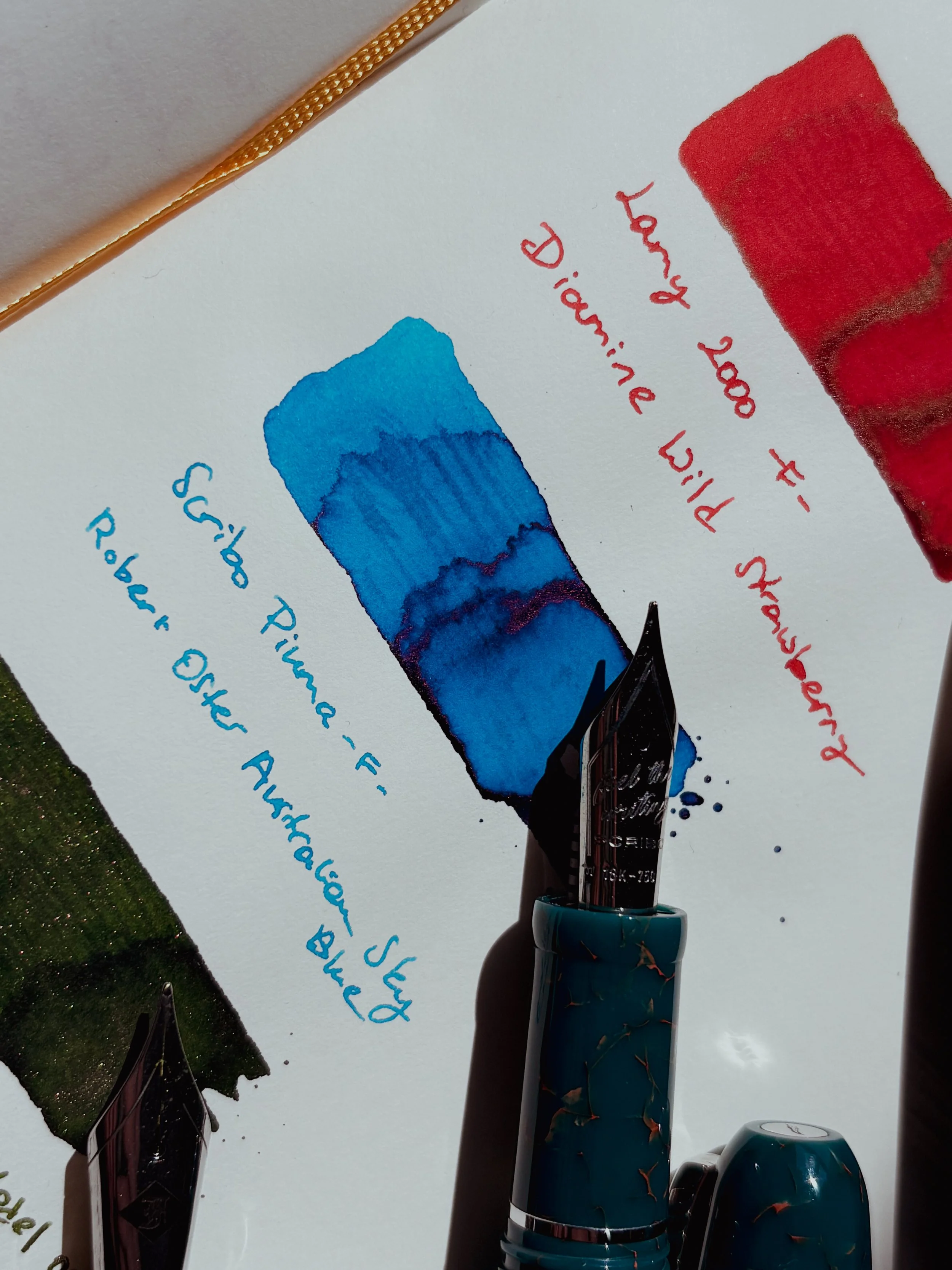 Scribo Piuma Impressione fountain pen filled with Robert Oster Australian Sky Blue fountain pen ink.